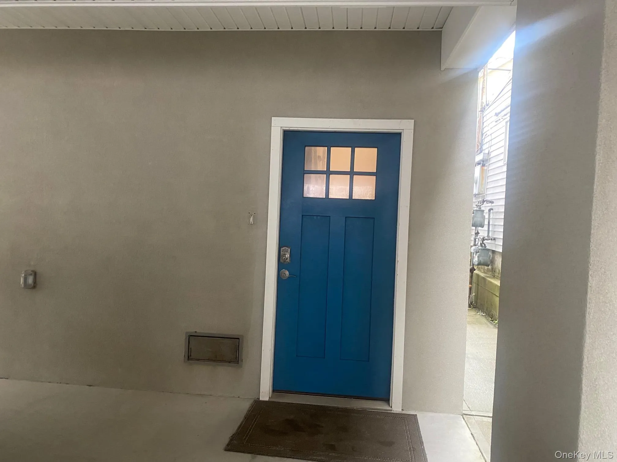 Private Property entrance featuring stucco siding Private Property entrance featuring stucco siding