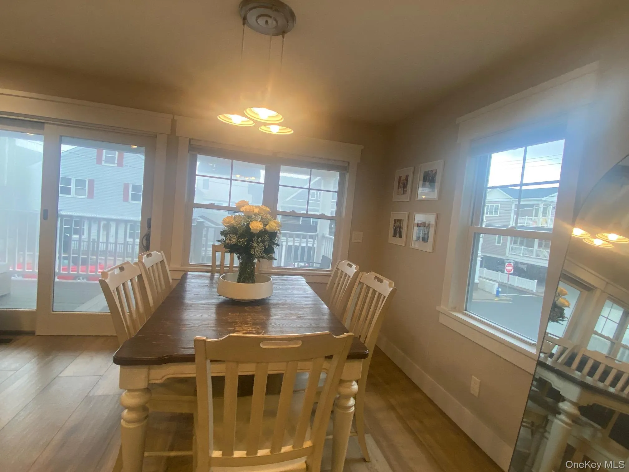 Dining room featuring wood finished floors and baseboards Dining room featuring wood finished floors and baseboards