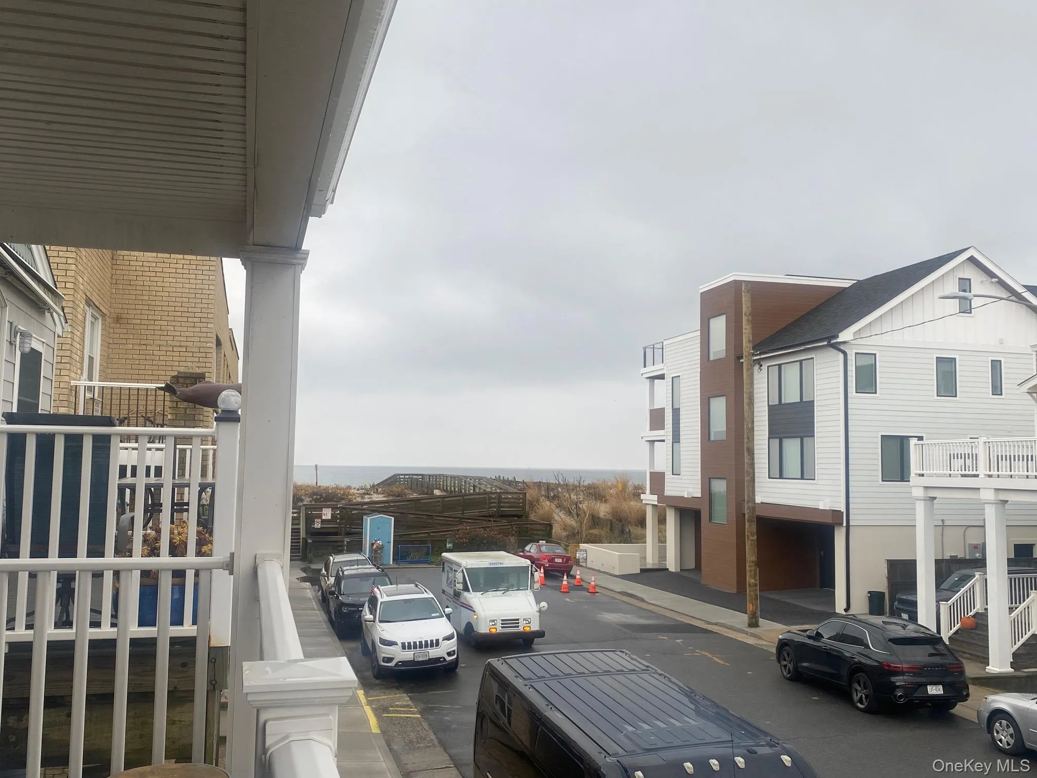Ocean view from deck - 2 houses off beach. Ocean view from deck - 2 houses off beach.