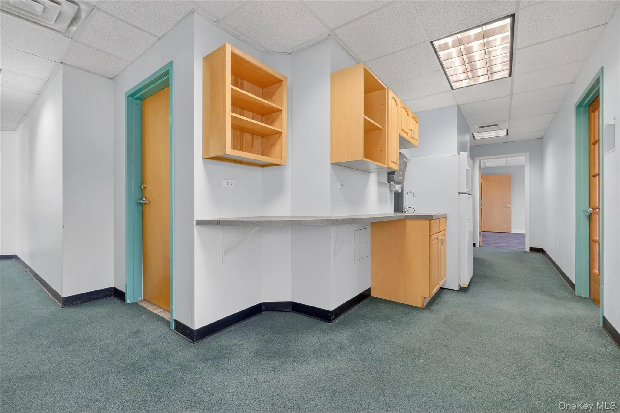 View of one of the two kitchenette areas View of one of the two kitchenette areas