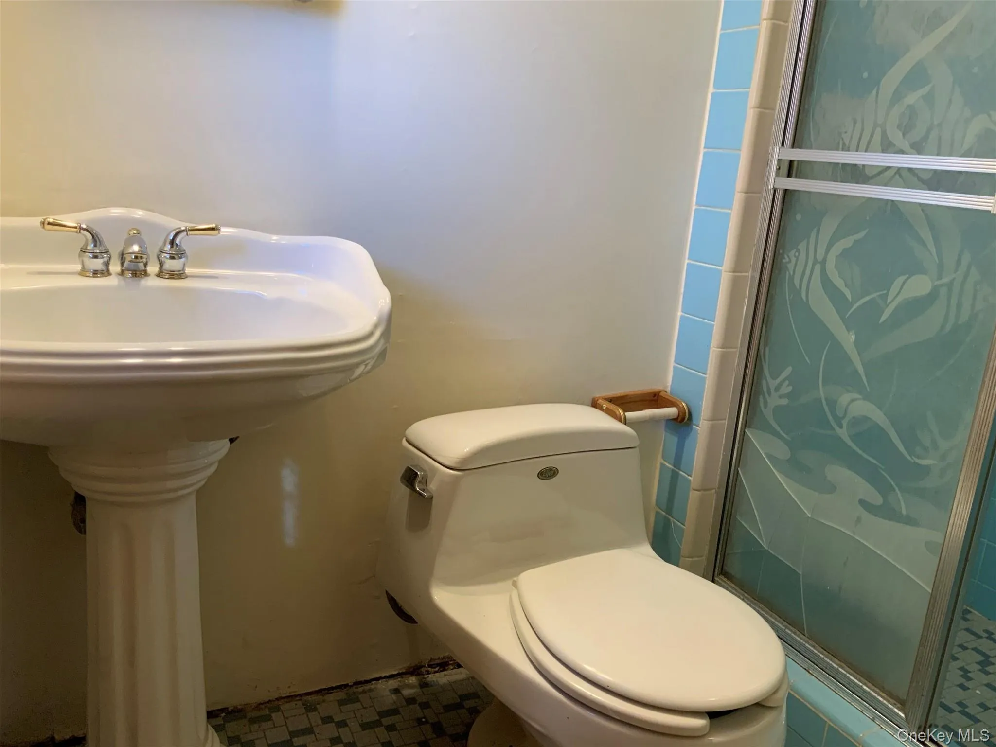 Full bath with toilet and a shower stall Full bath with toilet and a shower stall