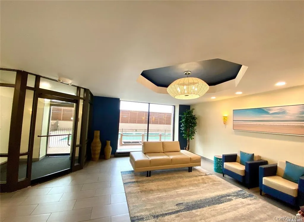 Lobby featuring a wall of windows Lobby featuring a wall of windows