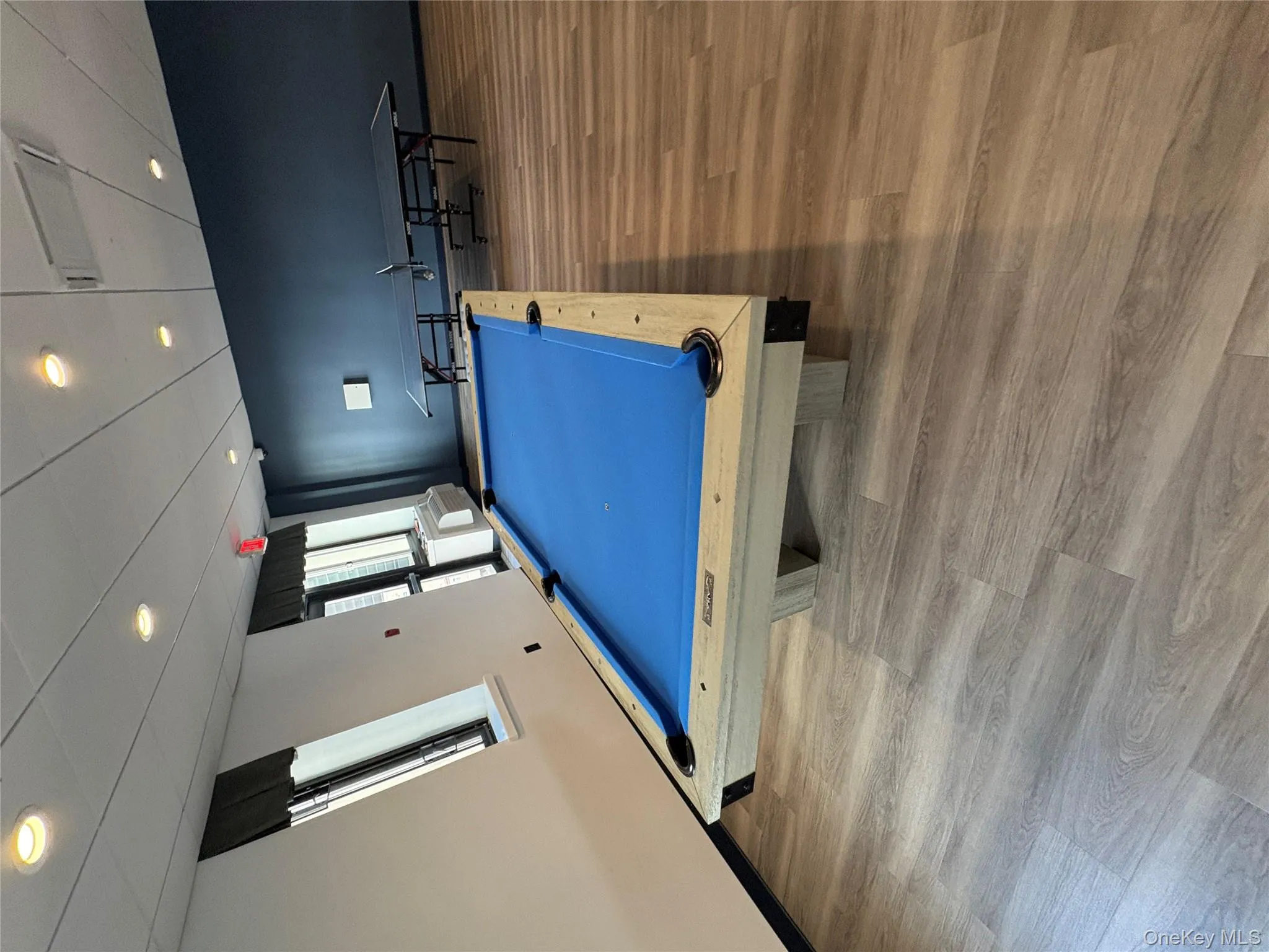 Recreation room with recessed lighting and pool table Recreation room with recessed lighting and pool table