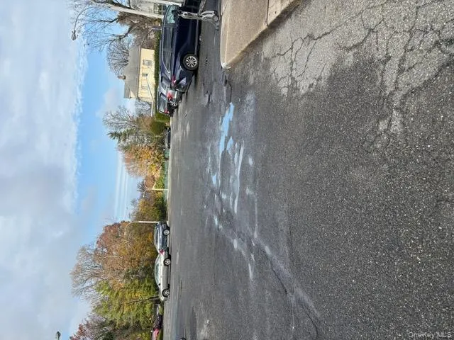 View of uncovered parking lot View of uncovered parking lot