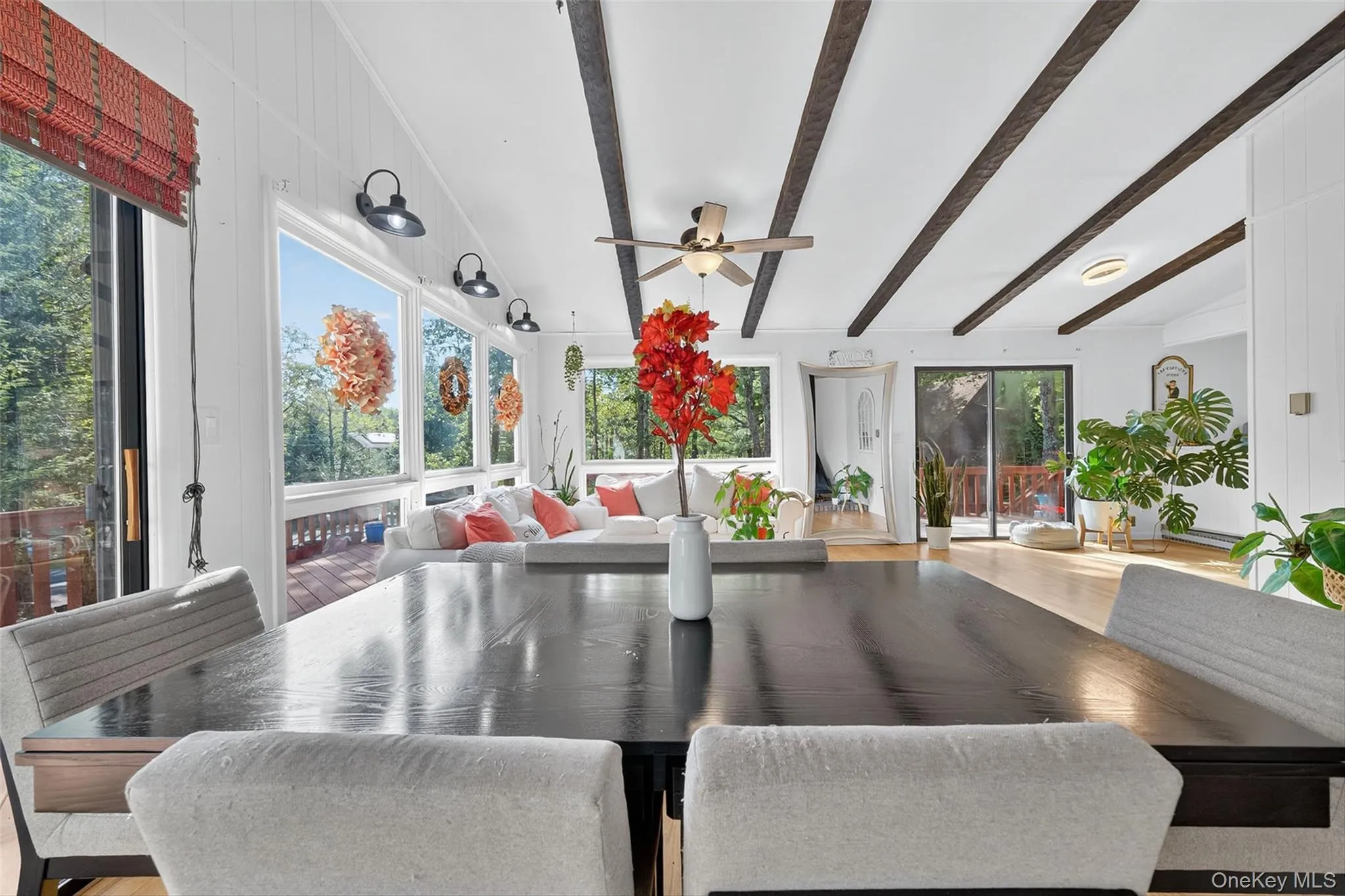 Sunroom / solarium featuring beam ceiling Sunroom / solarium featuring beam ceiling