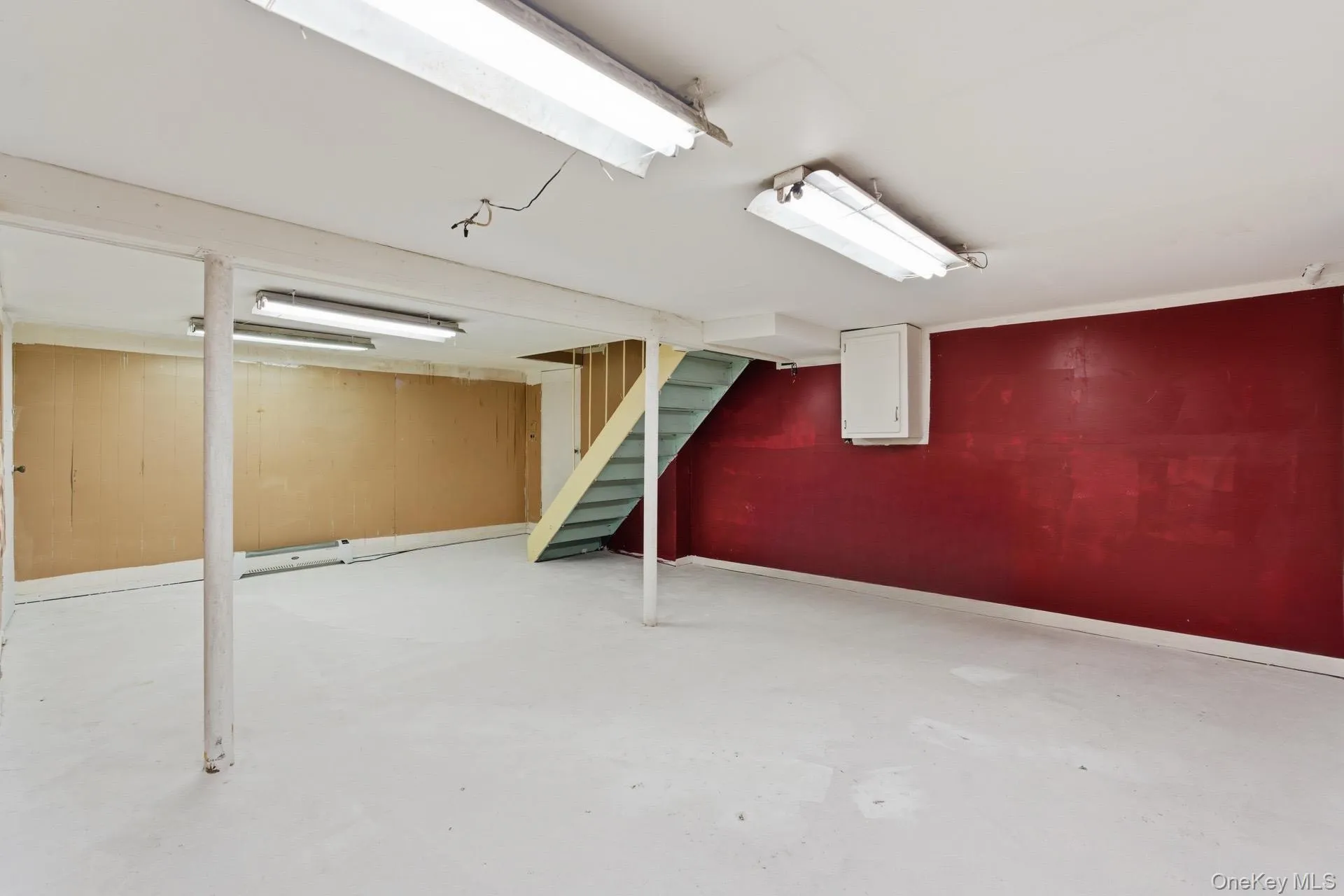 Finished basement with stairway Finished basement with stairway