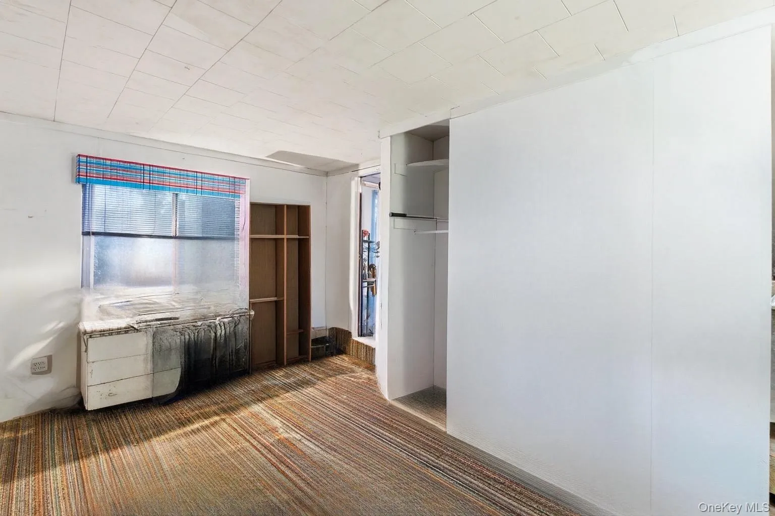 Unfurnished bedroom featuring carpet floors Unfurnished bedroom featuring carpet floors