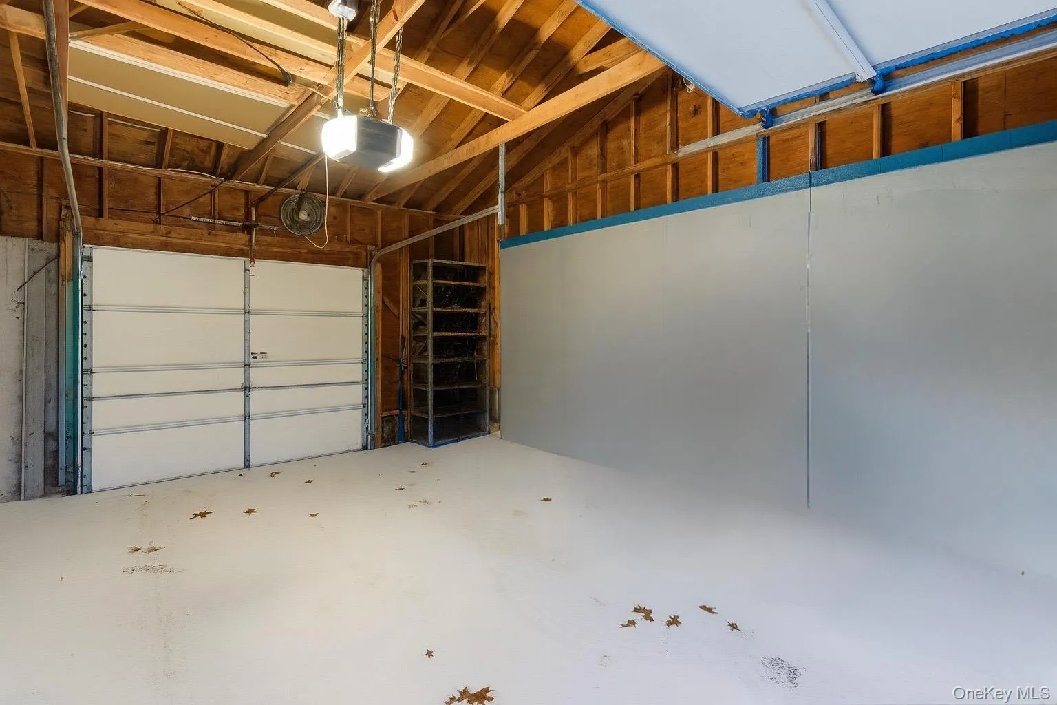 Garage with a garage door opener Garage with a garage door opener