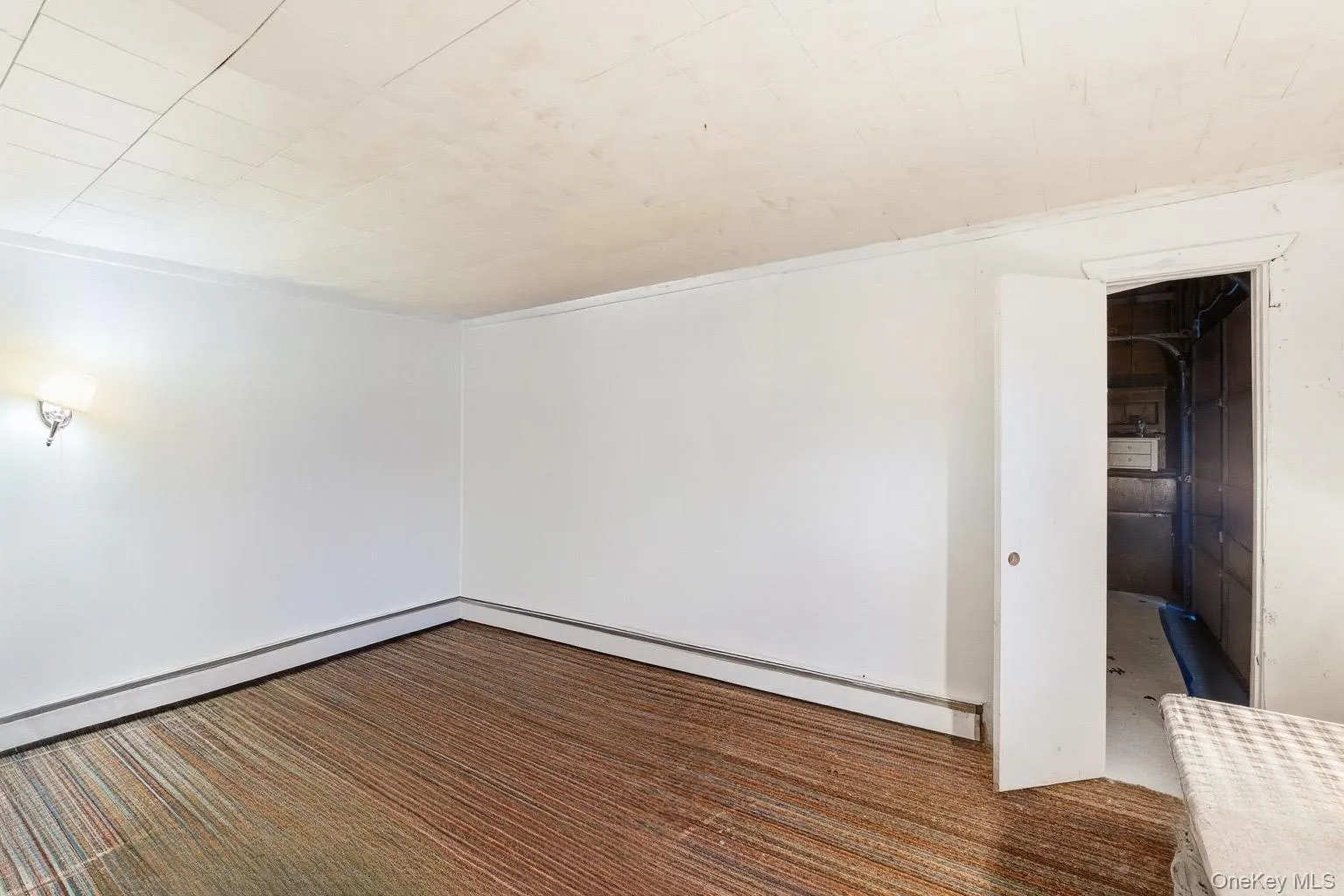 Spare room featuring a baseboard radiator Spare room featuring a baseboard radiator