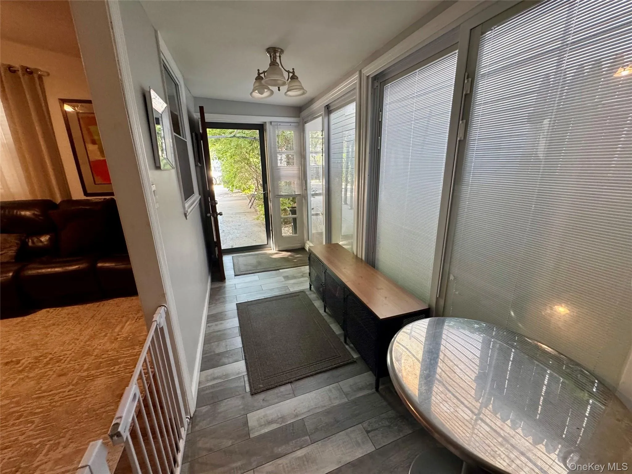 Entryway with wood finish floors Entryway with wood finish floors