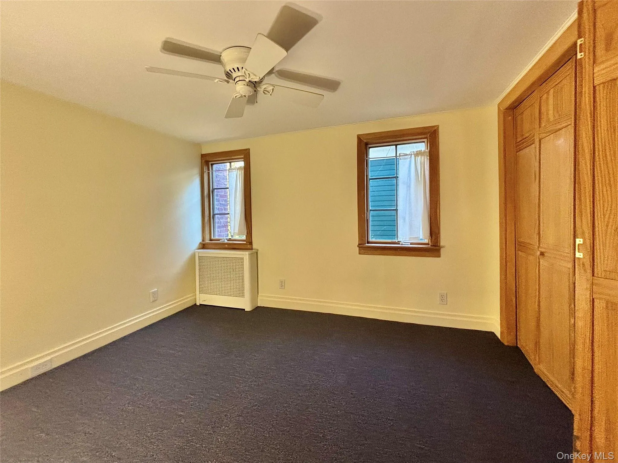 Bedroom on 1st floor with ceiling fan Bedroom on 1st floor with ceiling fan