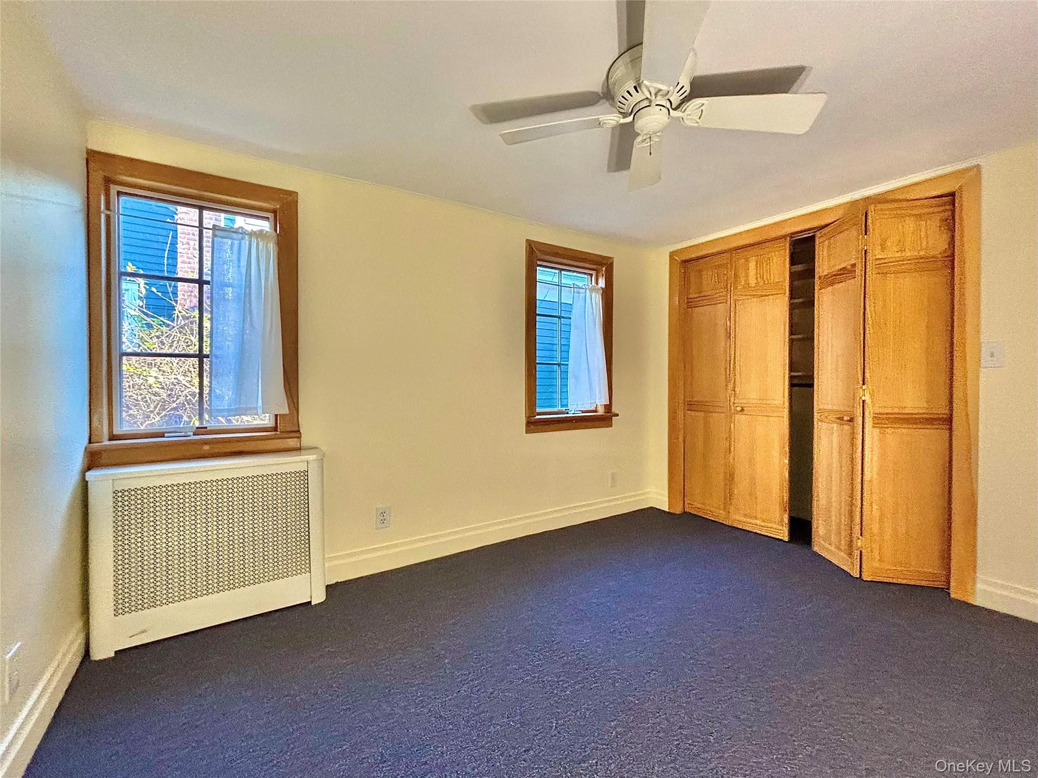 Bedroom with new carpeting Bedroom with new carpeting