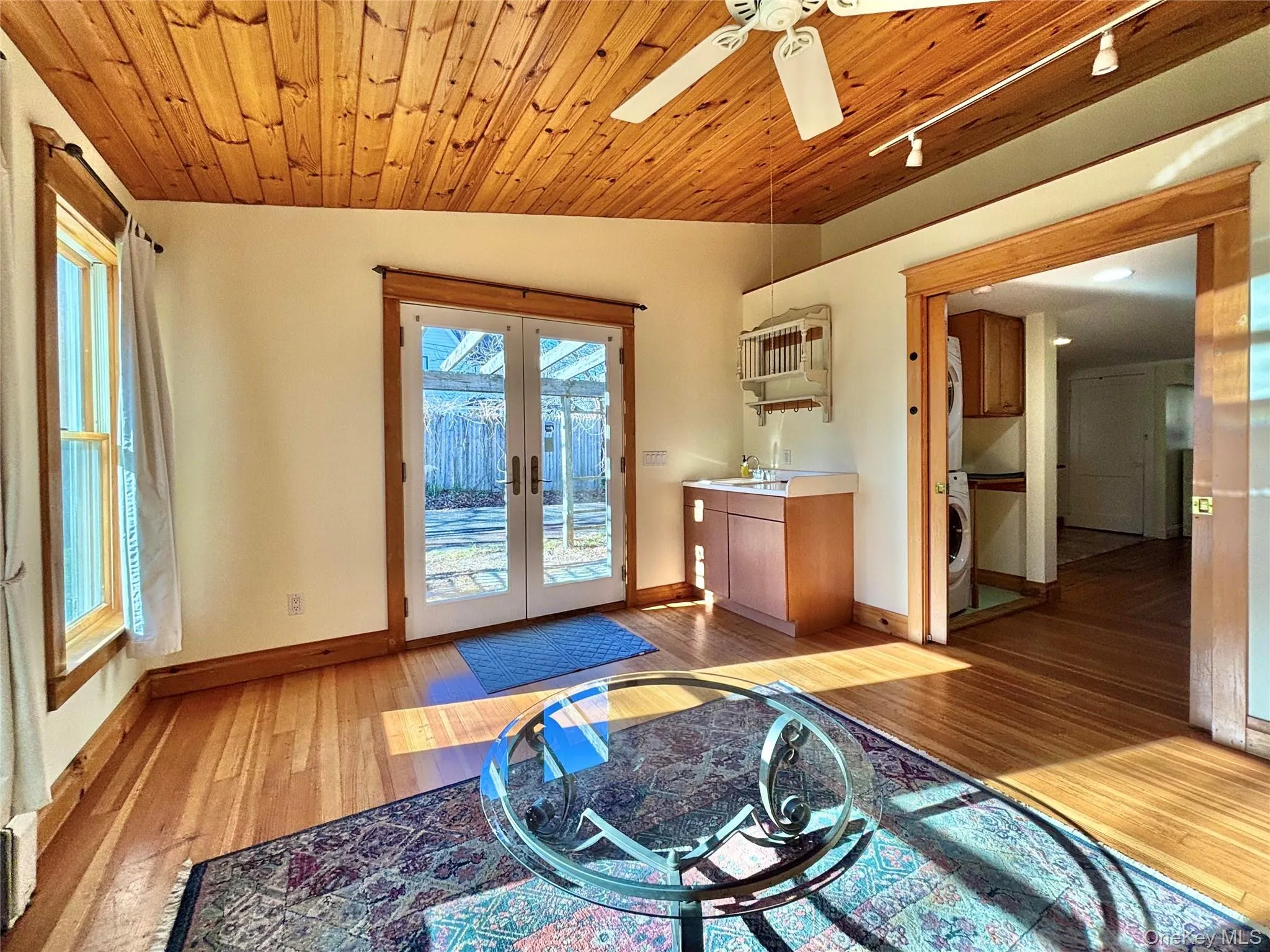Family/Living room with a sink and French doors out to the patio Family/Living room with a sink and French doors out to the patio