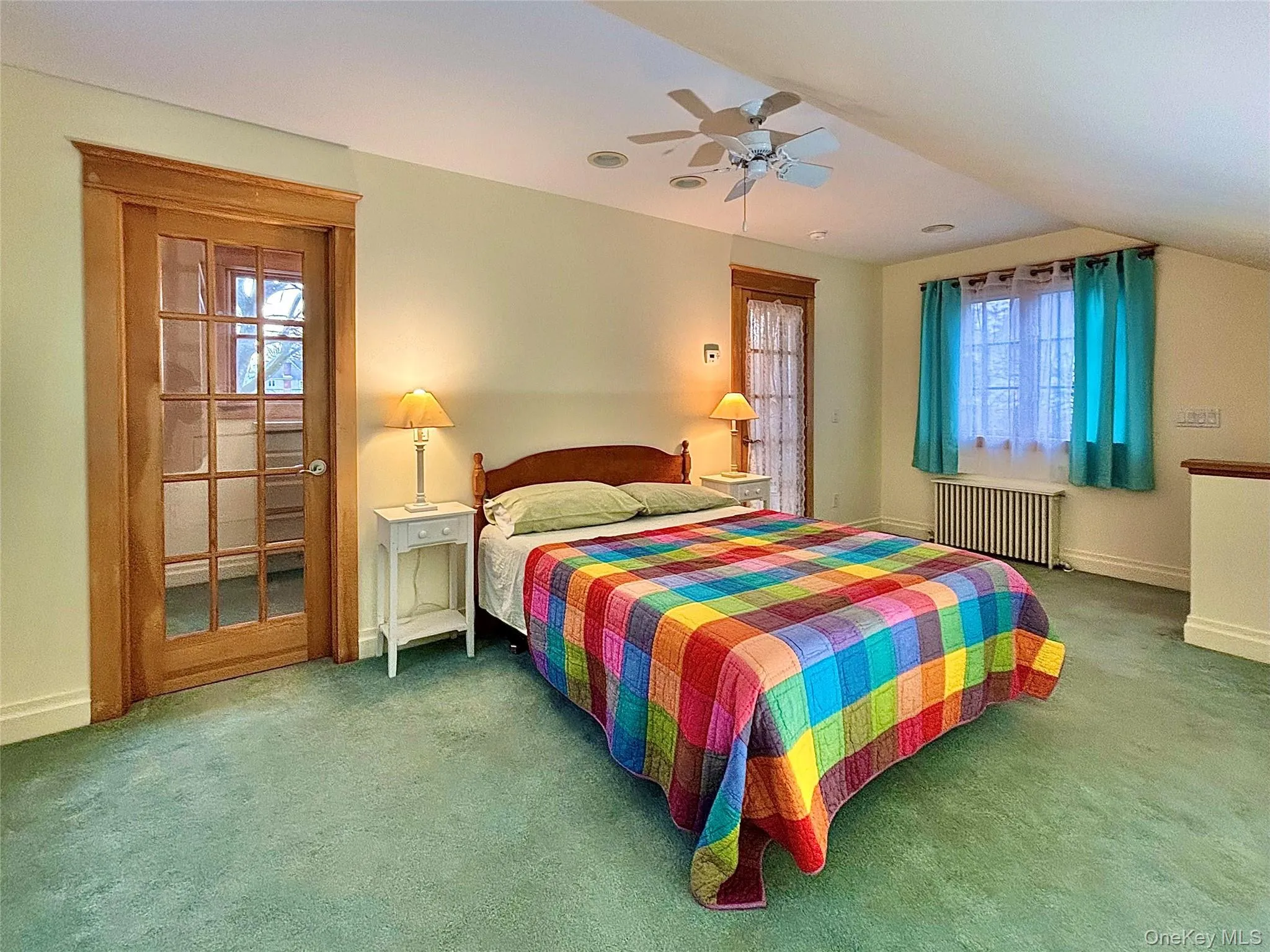 Primary Bedroom on 2nd floor with French doors into ensuite bath and walk-in closet Primary Bedroom on 2nd floor with French doors into ensuite bath and walk-in closet