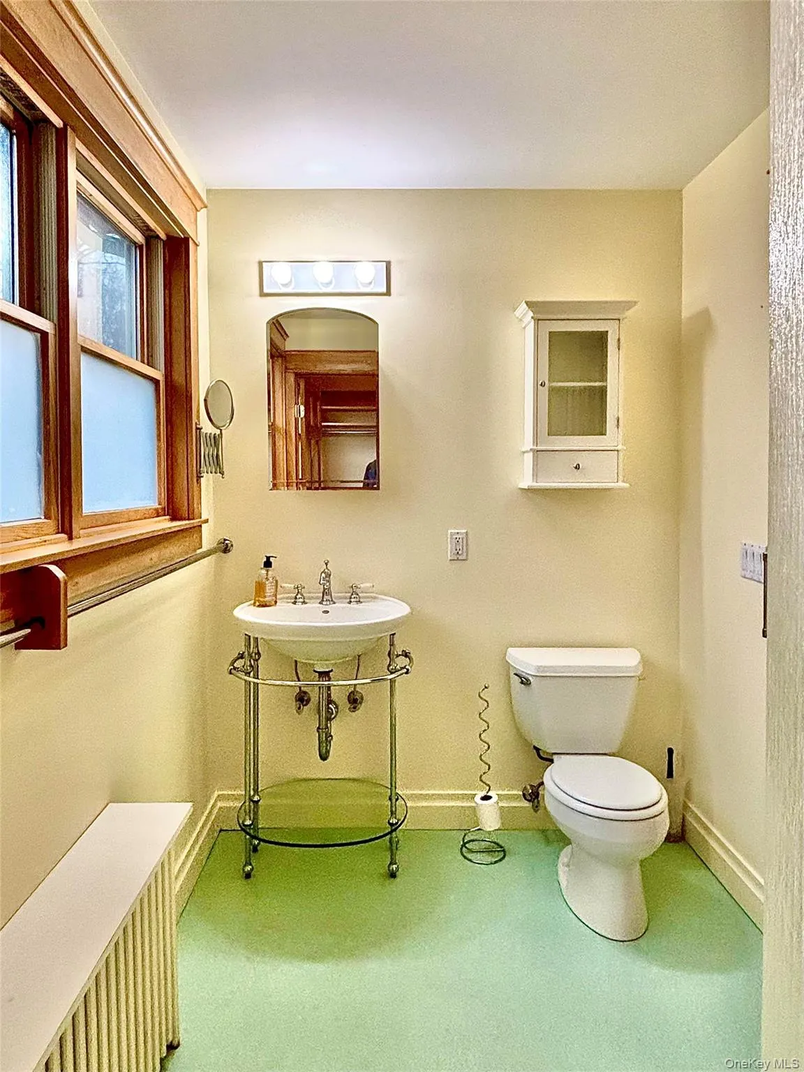Primary Bathroom with sink and commode Primary Bathroom with sink and commode