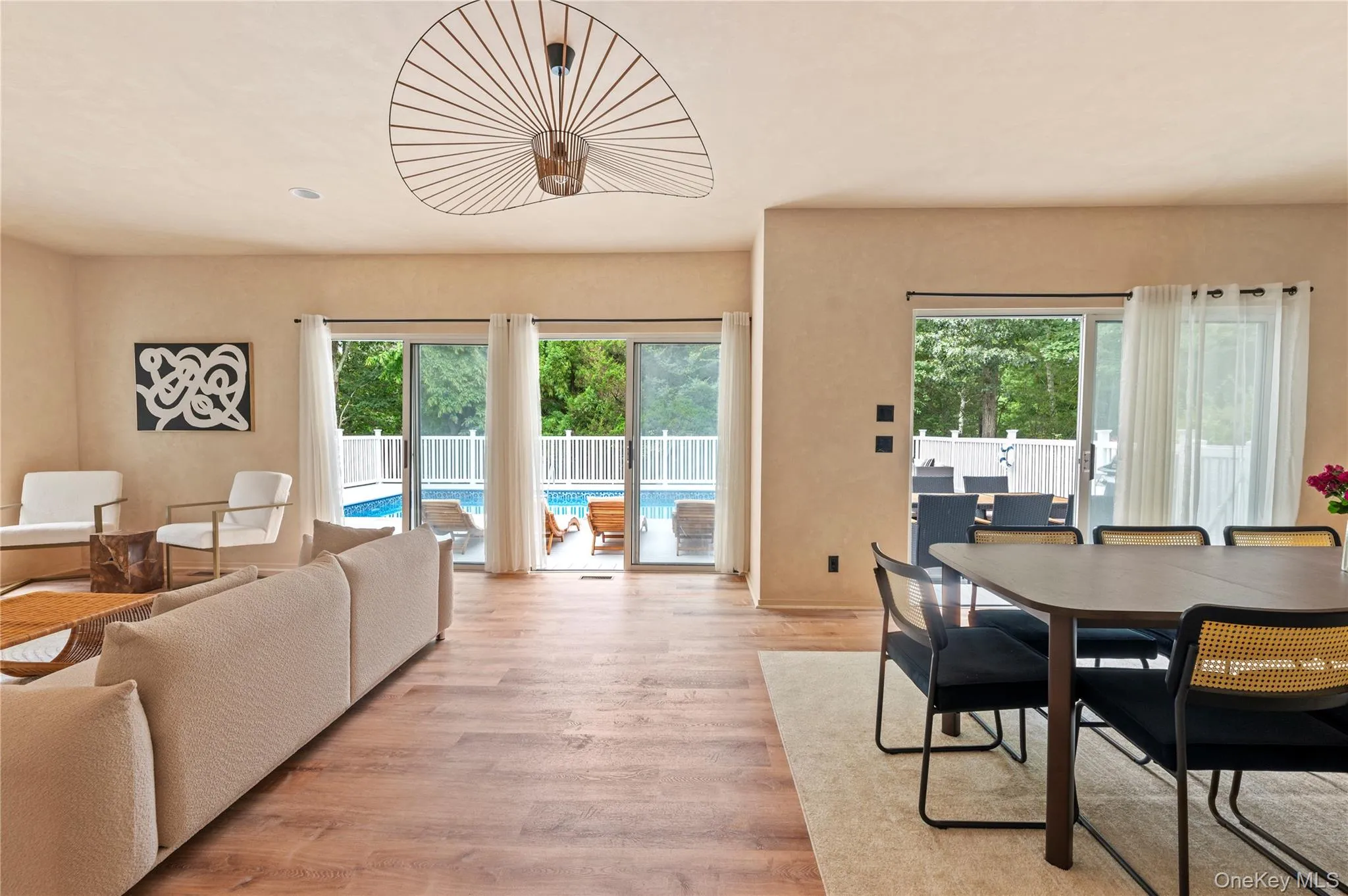 Dining area featuring light wood-type flooring Dining area featuring light wood-type flooring