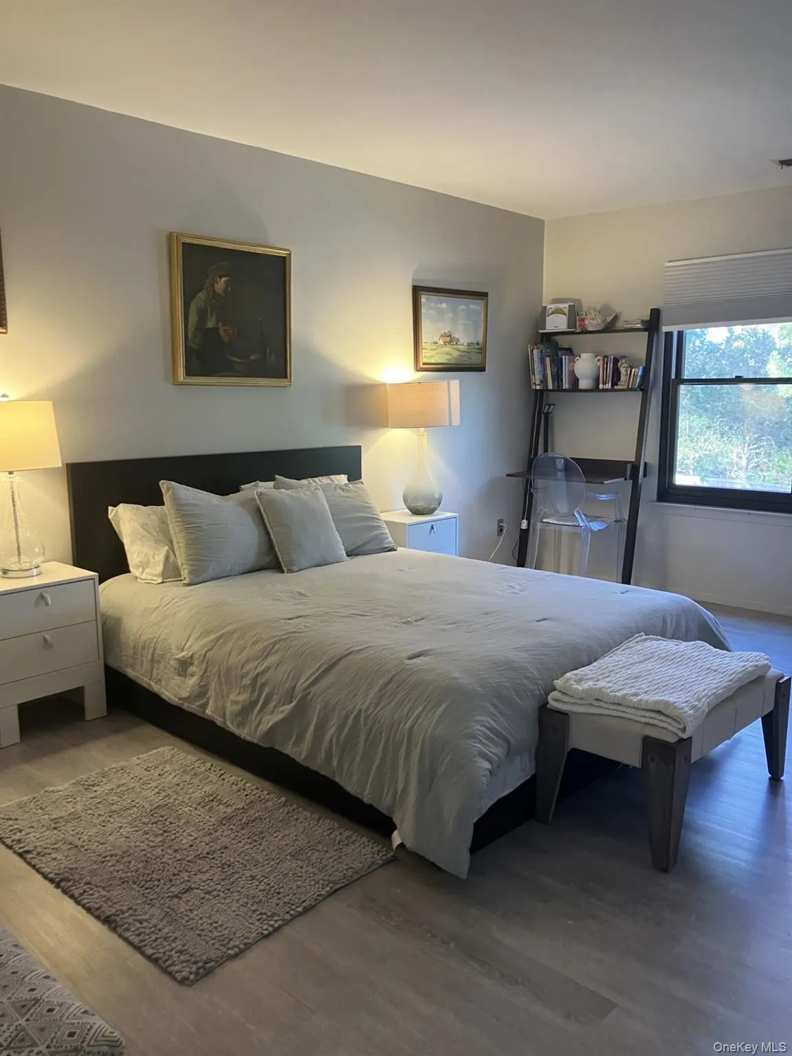 Bedroom with wood finished floors Bedroom with wood finished floors
