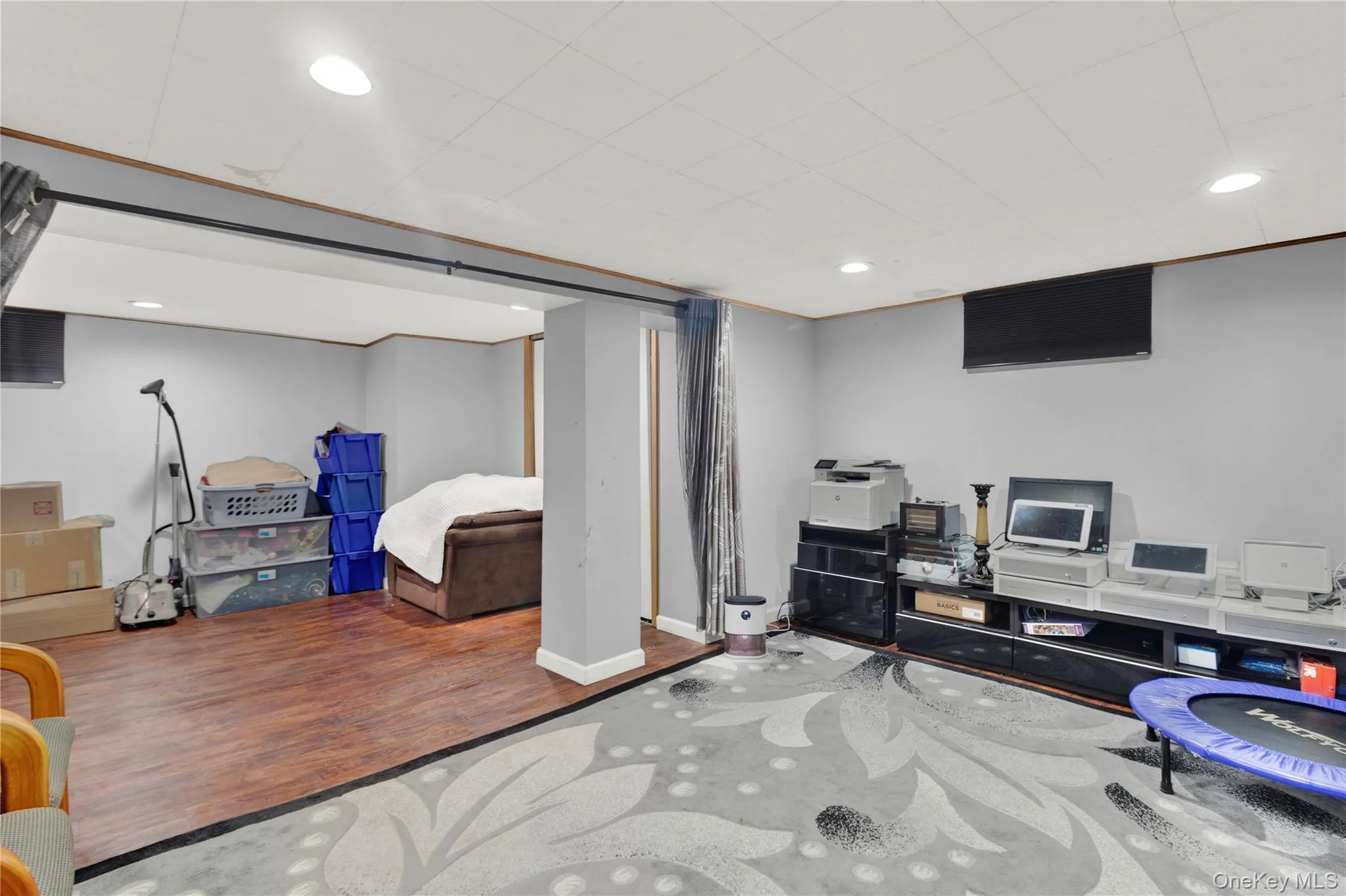 Bedroom featuring wood finished floors and recessed lighting Bedroom featuring wood finished floors and recessed lighting