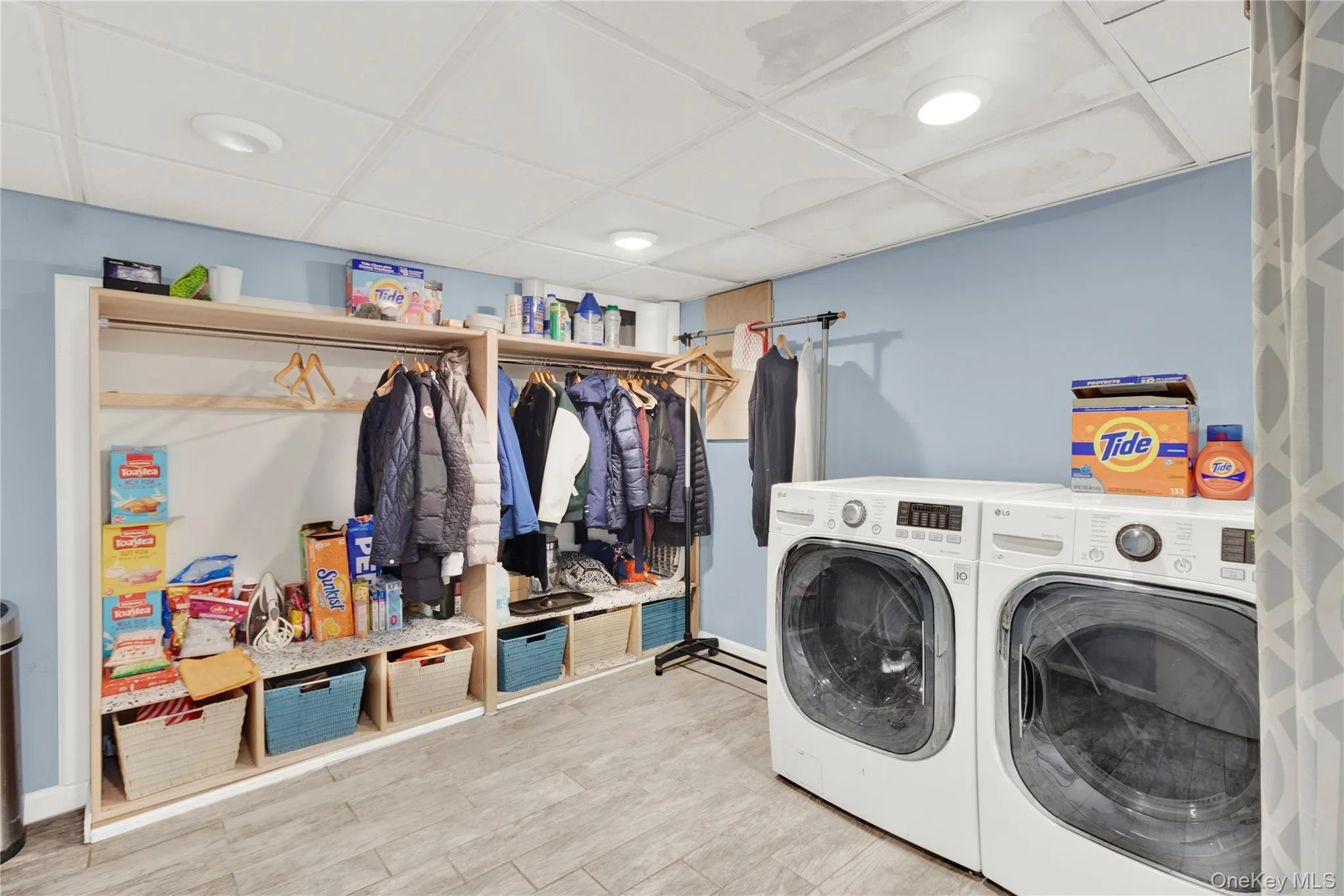 Laundry room featuring washer and clothes dryer Laundry room featuring washer and clothes dryer