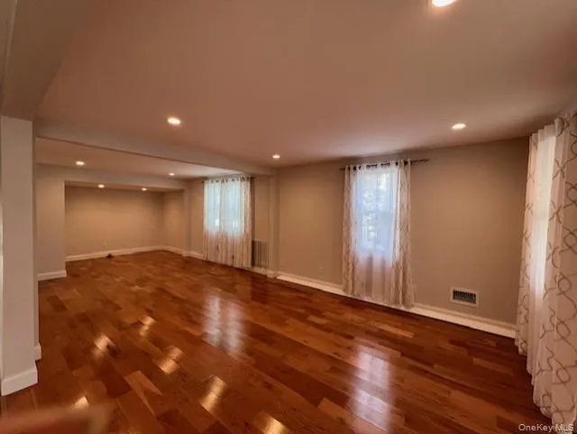 LR/DR featuring dark wood-type flooring and recessed lighting LR/DR featuring dark wood-type flooring and recessed lighting