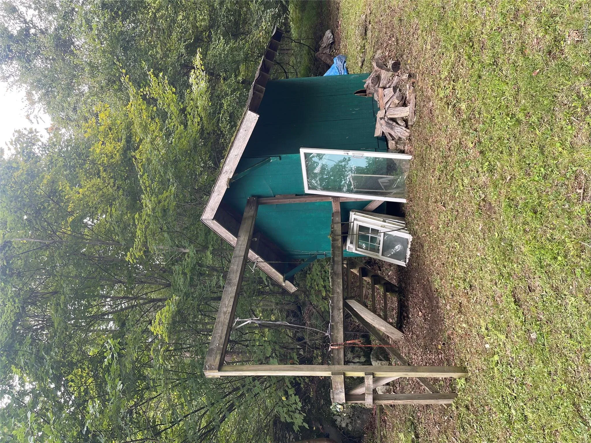 View of poultry coop with a yard View of poultry coop with a yard