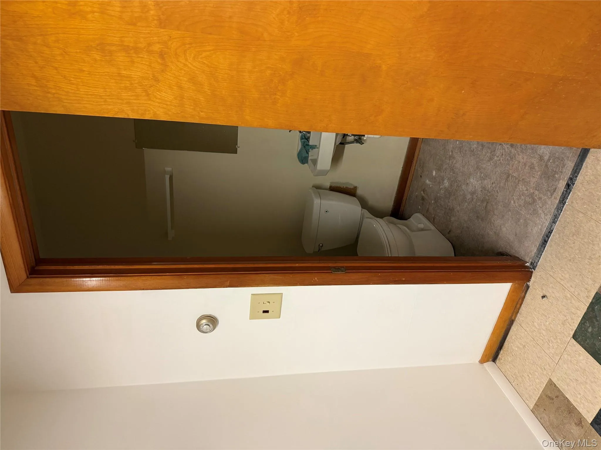 Bathroom featuring baseboards Bathroom featuring baseboards