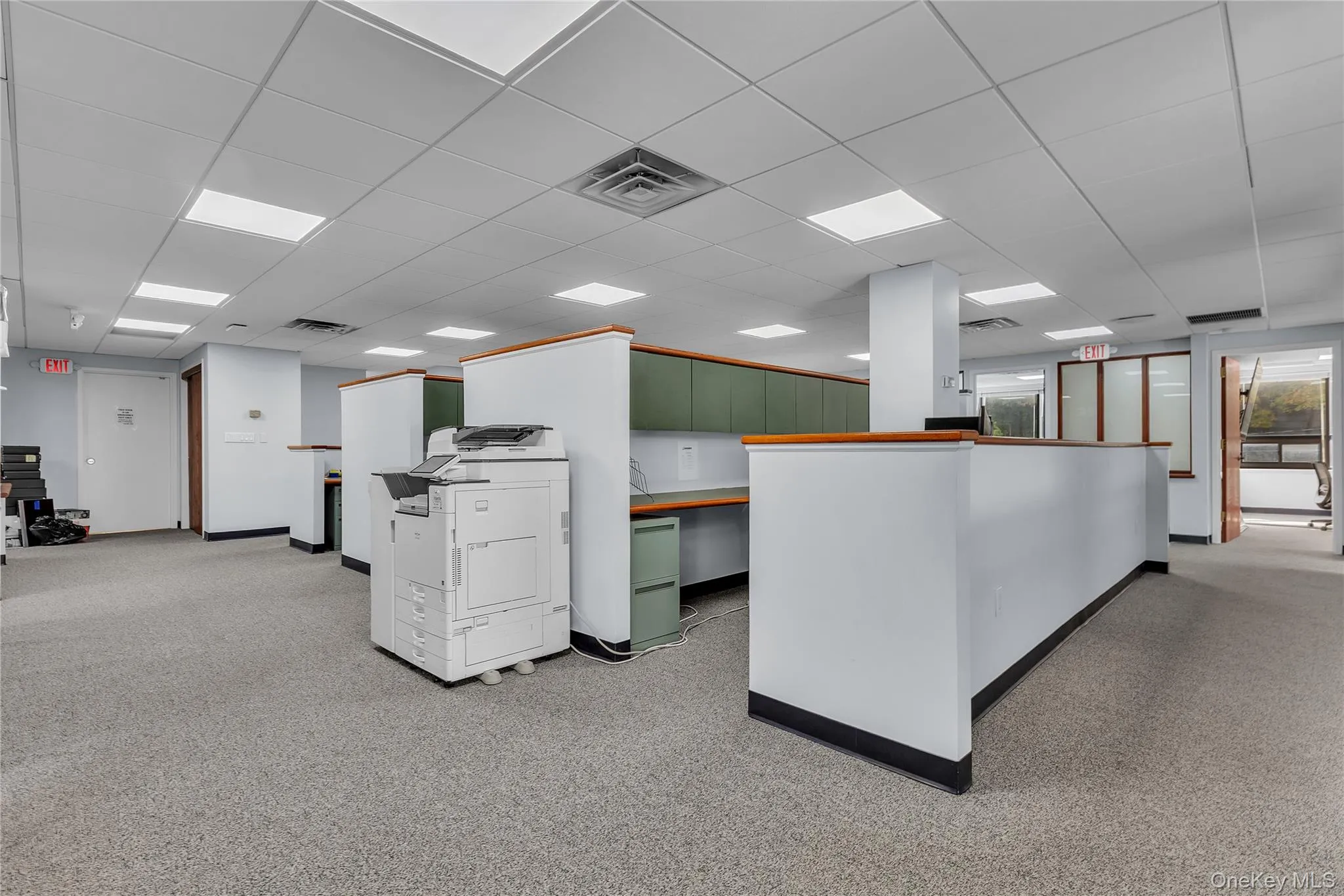 Unfurnished office with a paneled ceiling Unfurnished office with a paneled ceiling