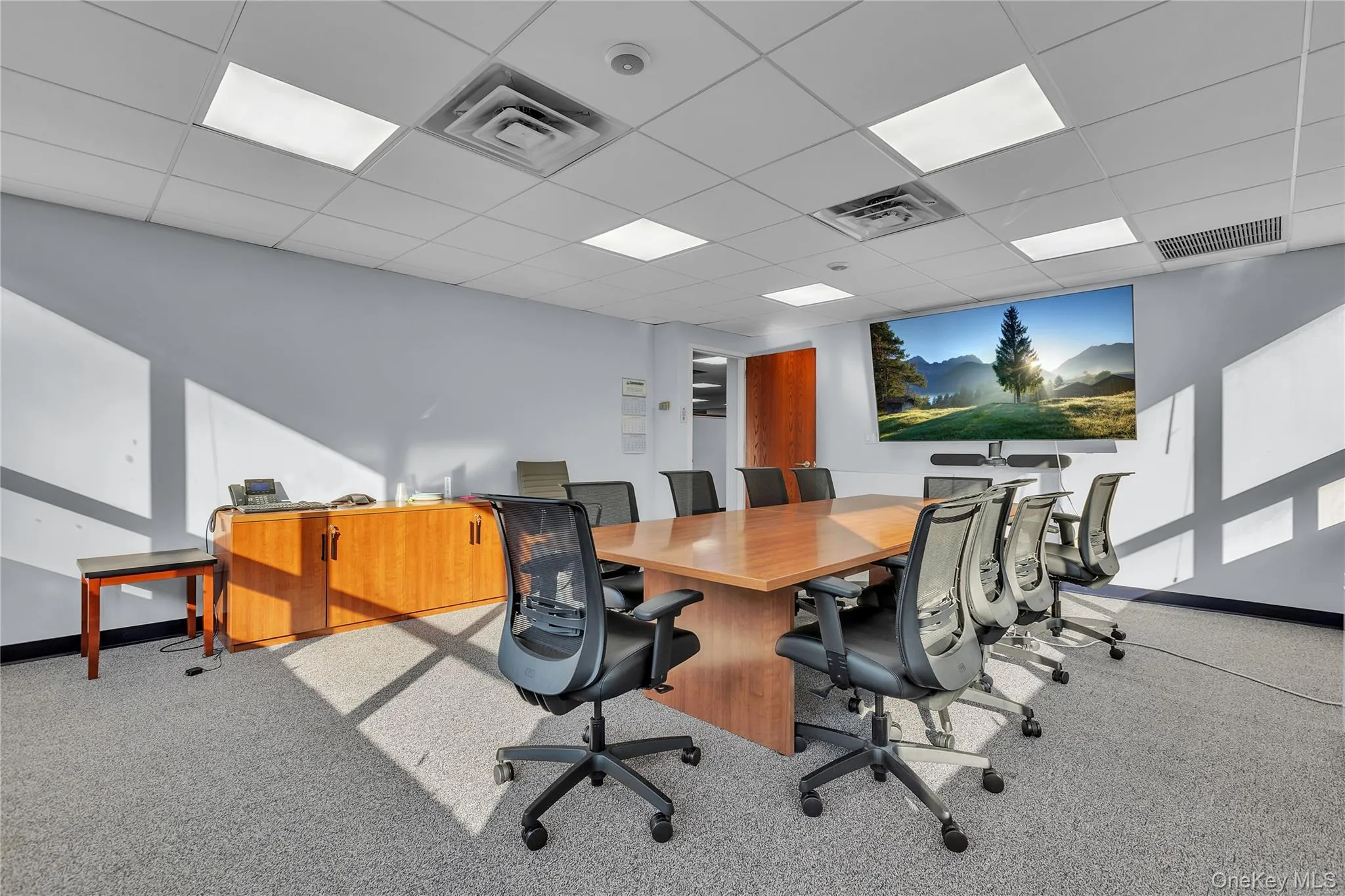Office featuring a drop ceiling Office featuring a drop ceiling