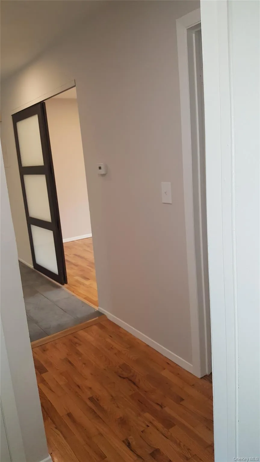 Corridor with wood finished floors Corridor with wood finished floors