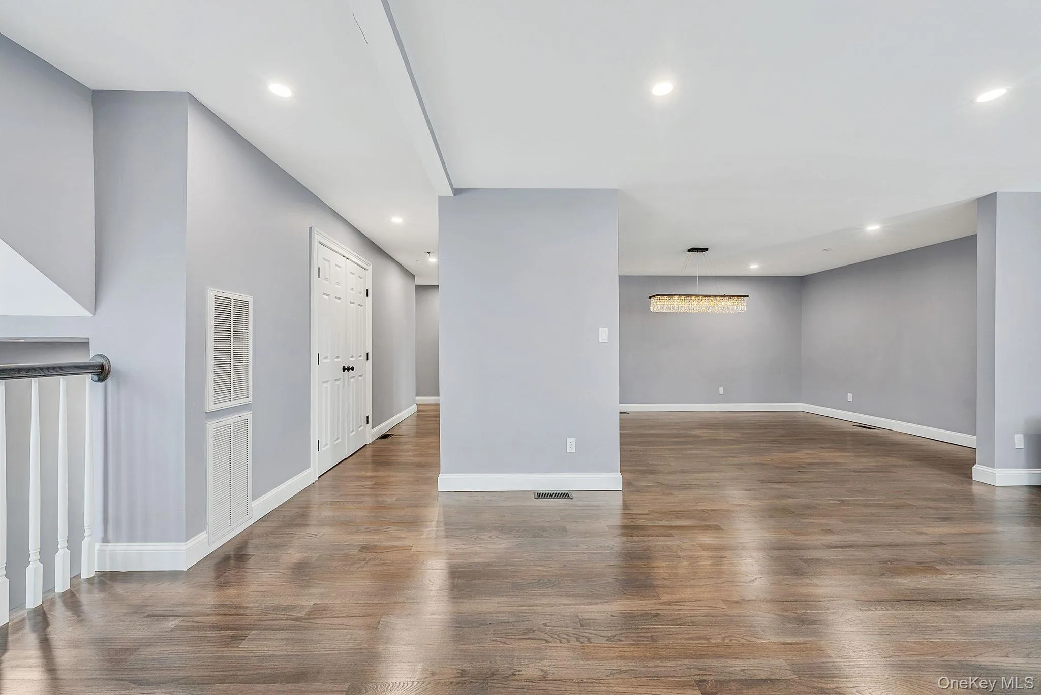 Spare room with recessed lighting and wood finished floors Spare room with recessed lighting and wood finished floors