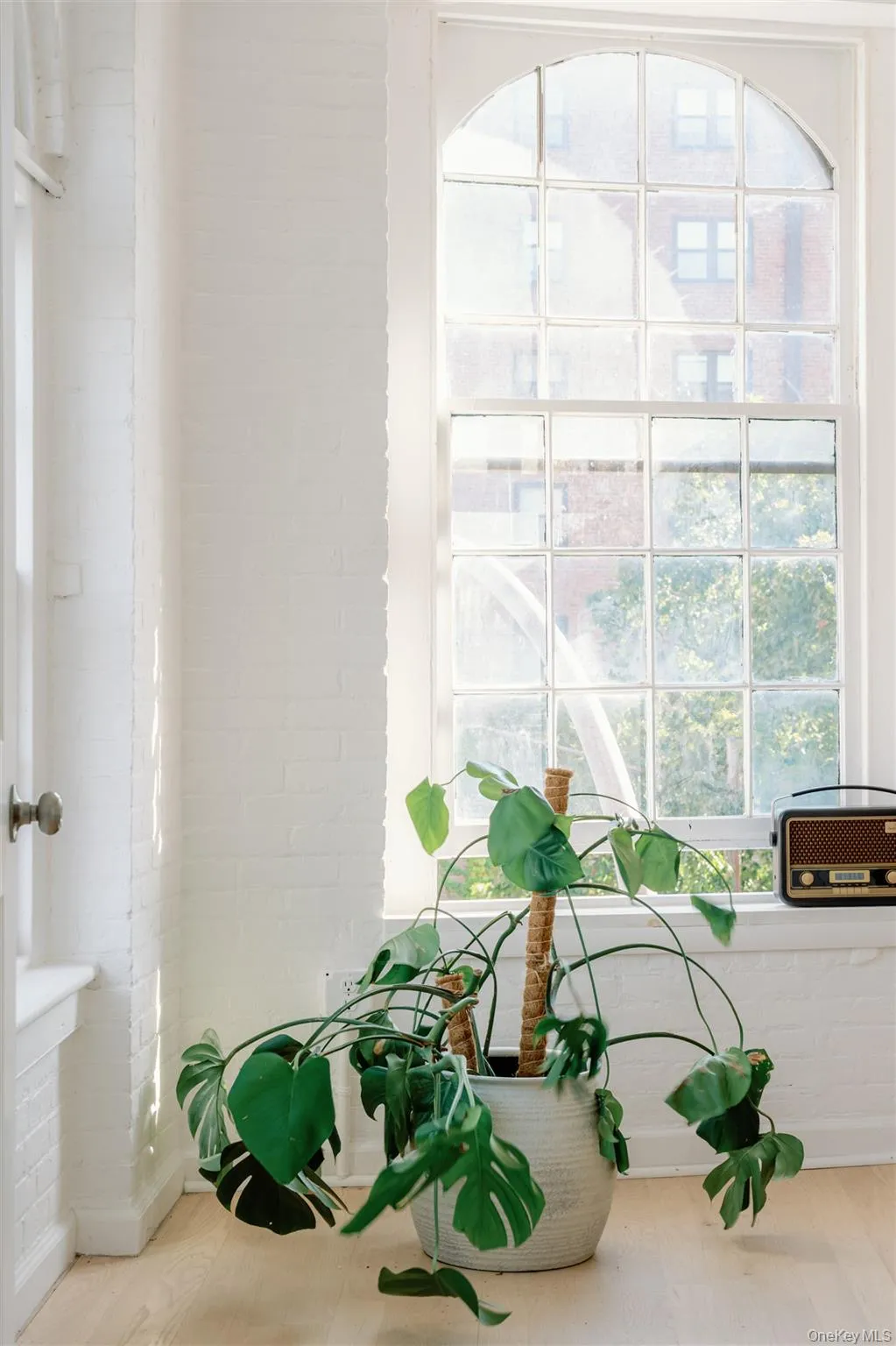 Detailed view of wood finished floors and brick wall Detailed view of wood finished floors and brick wall