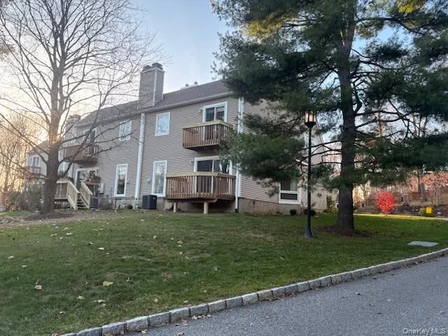 Rear view of house showing plenty of lawn space Rear view of house showing plenty of lawn space