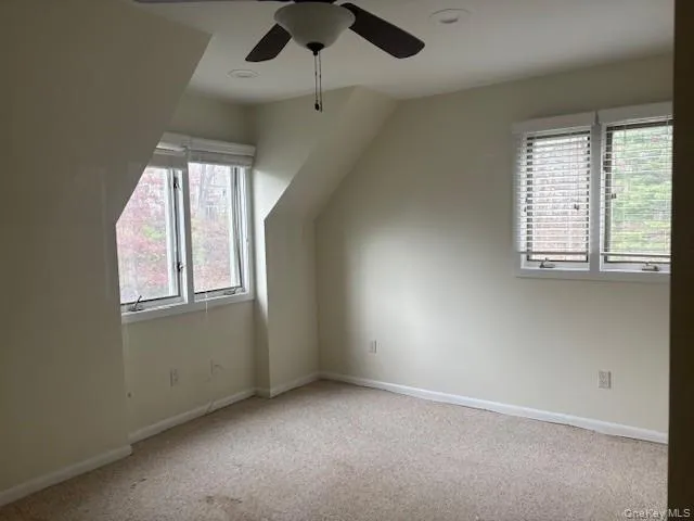 Second bedroom featuring carpet floors and a ceiling Second bedroom featuring carpet floors and a ceiling