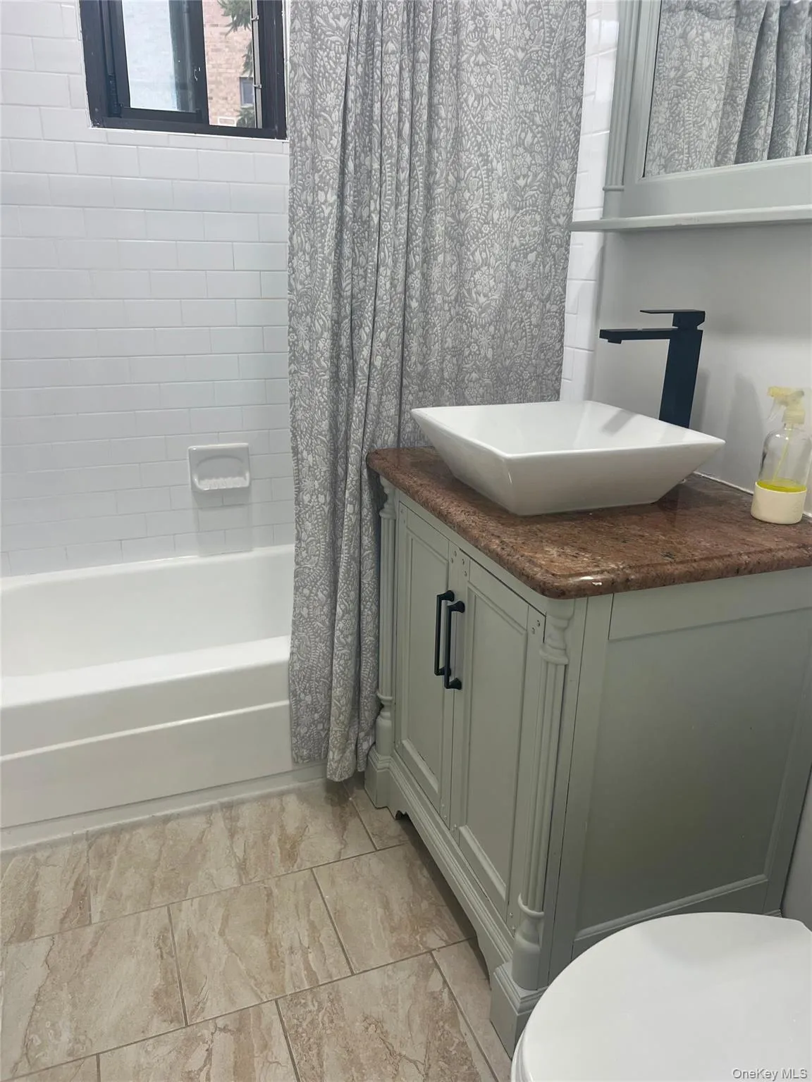 Full bath with shower / bathtub combination with curtain and vanity Full bath with shower / bathtub combination with curtain and vanity