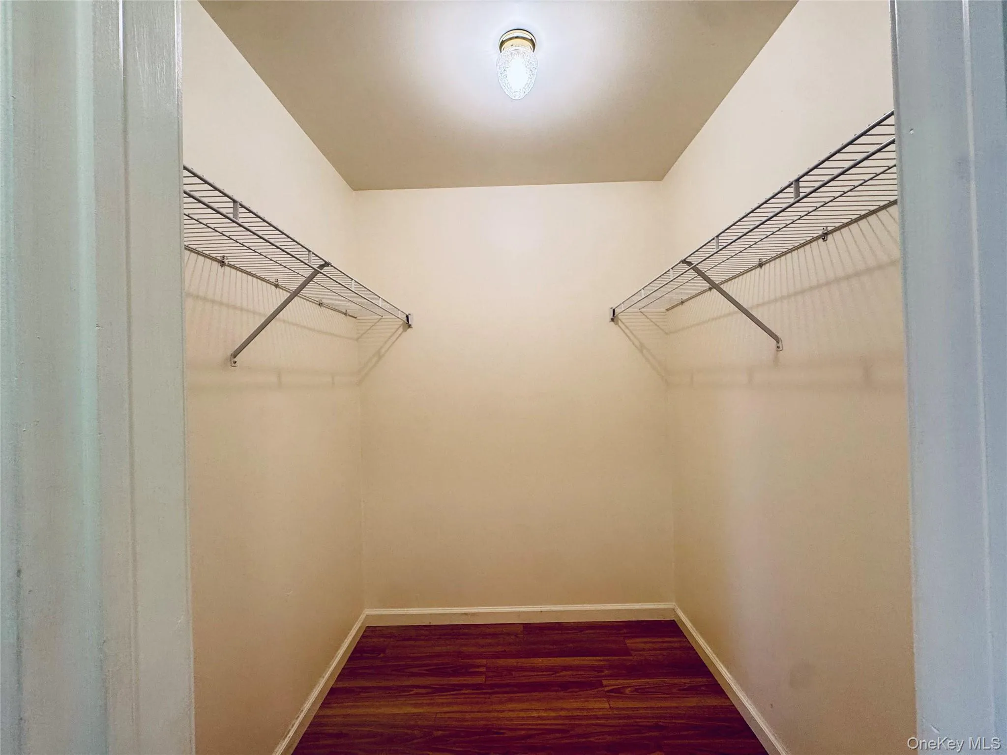 Primary Bedroom Walk- in closet Primary Bedroom Walk- in closet