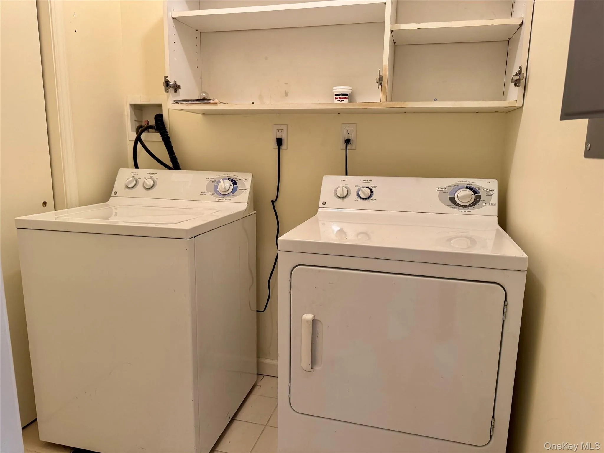 Laundry off the kitchen with washing machine and dryer Laundry off the kitchen with washing machine and dryer