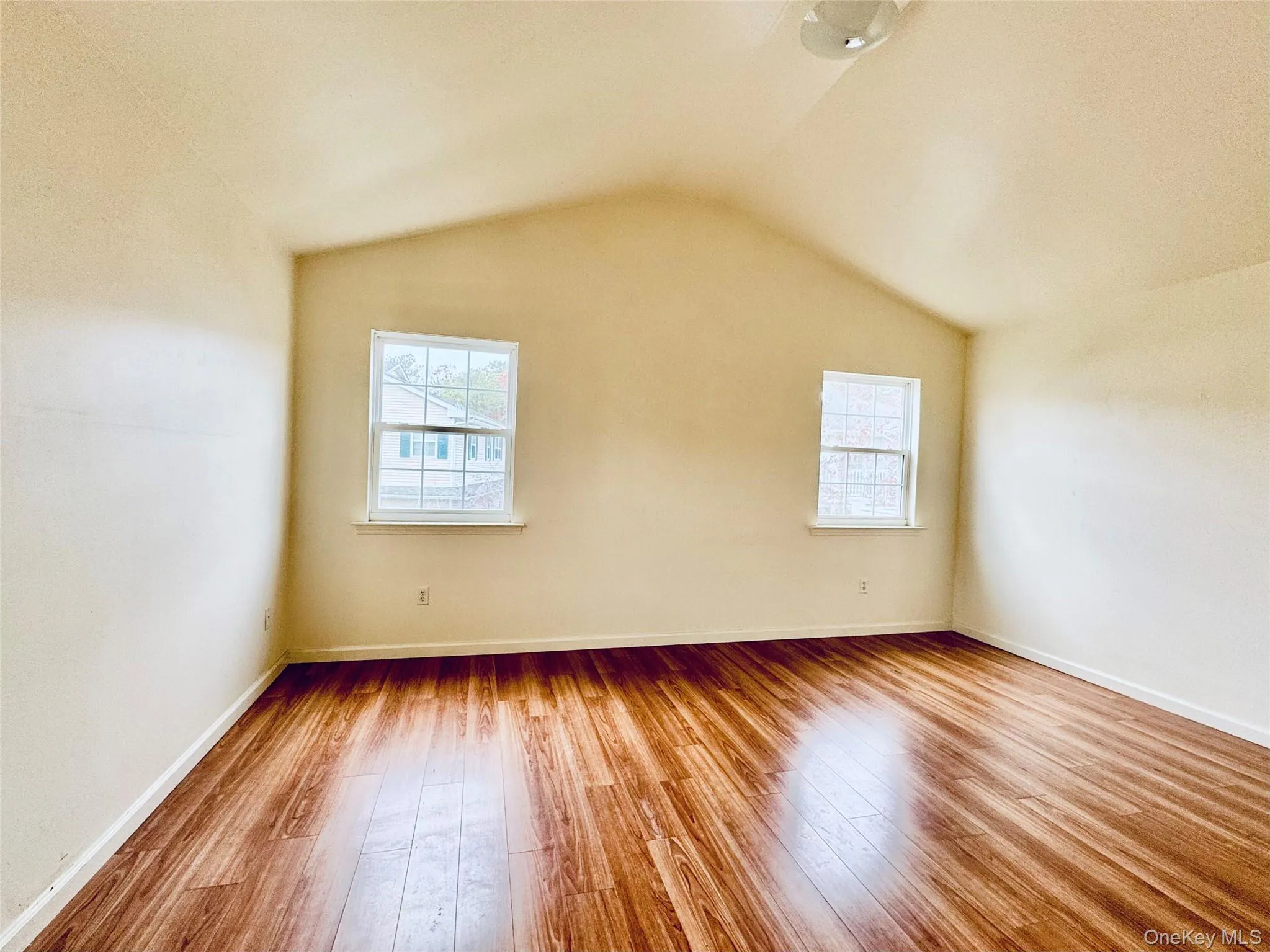 Gleaming wood floors and cathedral ceiling Gleaming wood floors and cathedral ceiling