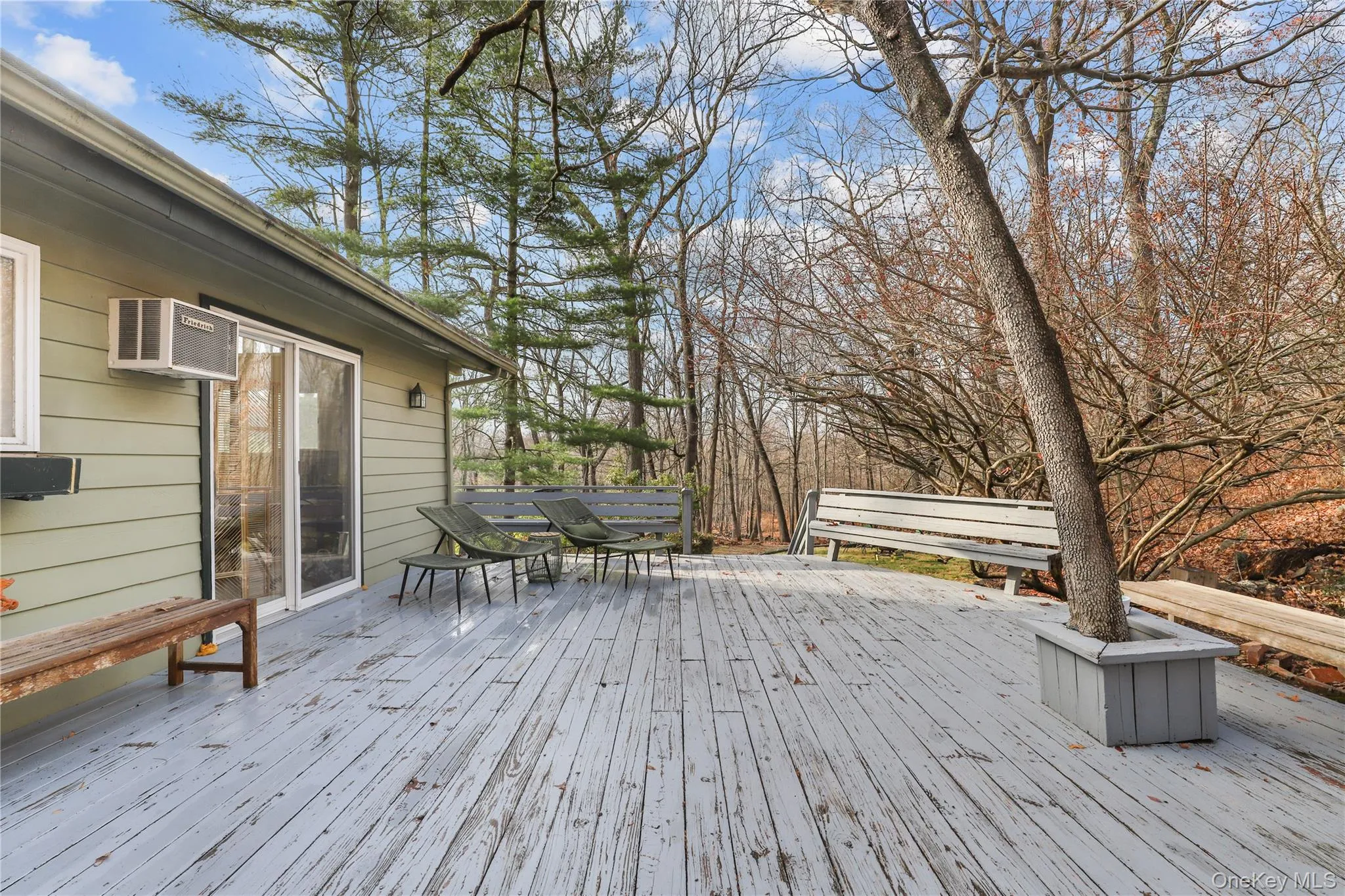 Wooden terrace with outdoor dining space Wooden terrace with outdoor dining space