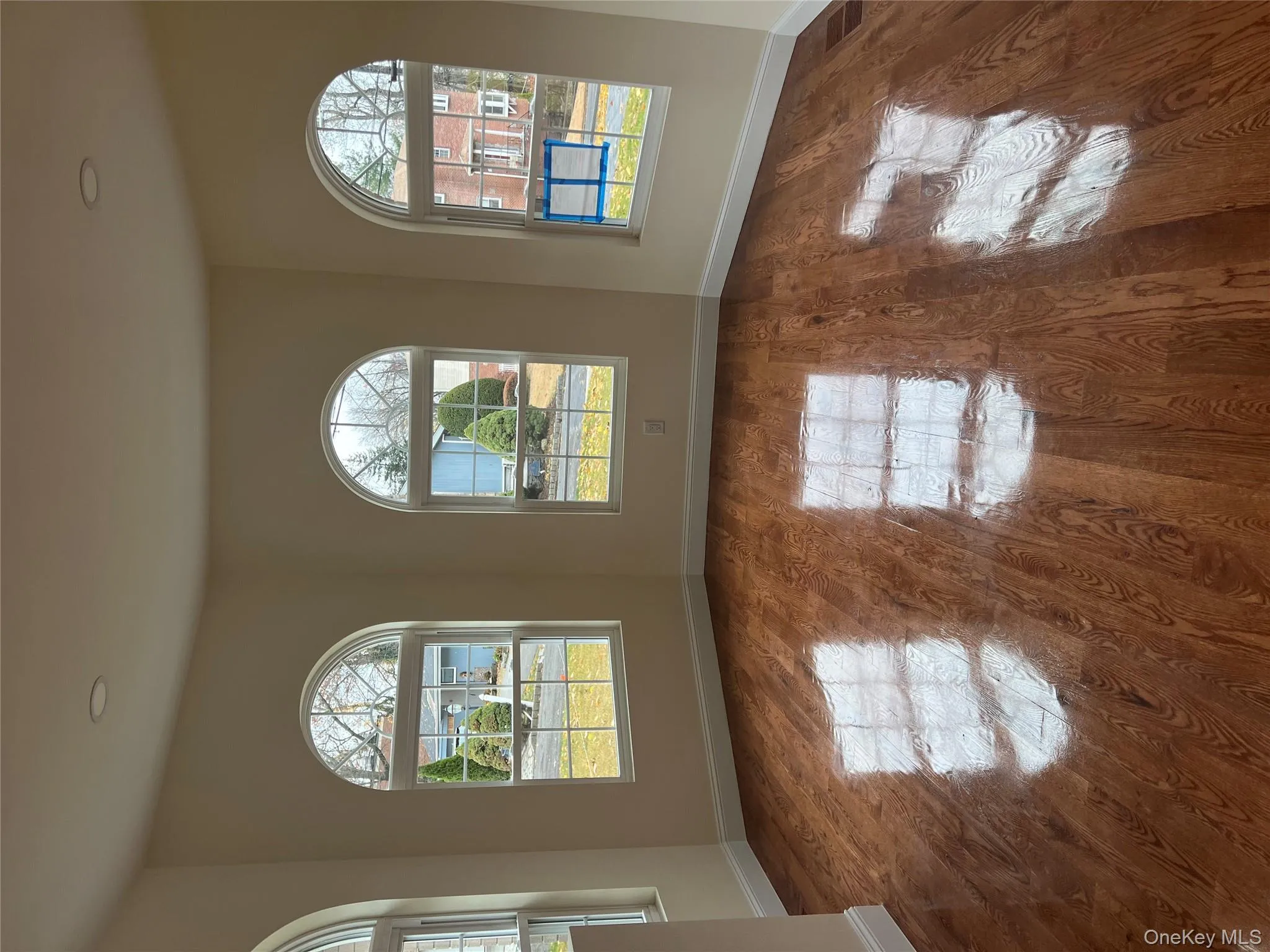 Spare room with wood finished floors, healthy amount of natural light, and recessed lighting Spare room with wood finished floors, healthy amount of natural light, and recessed lighting
