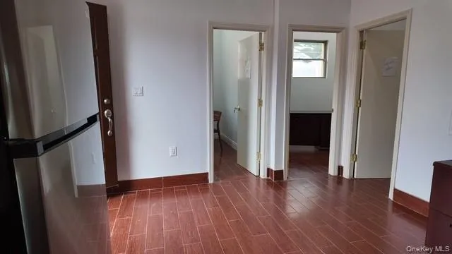 Corridor with wood finish floors Corridor with wood finish floors