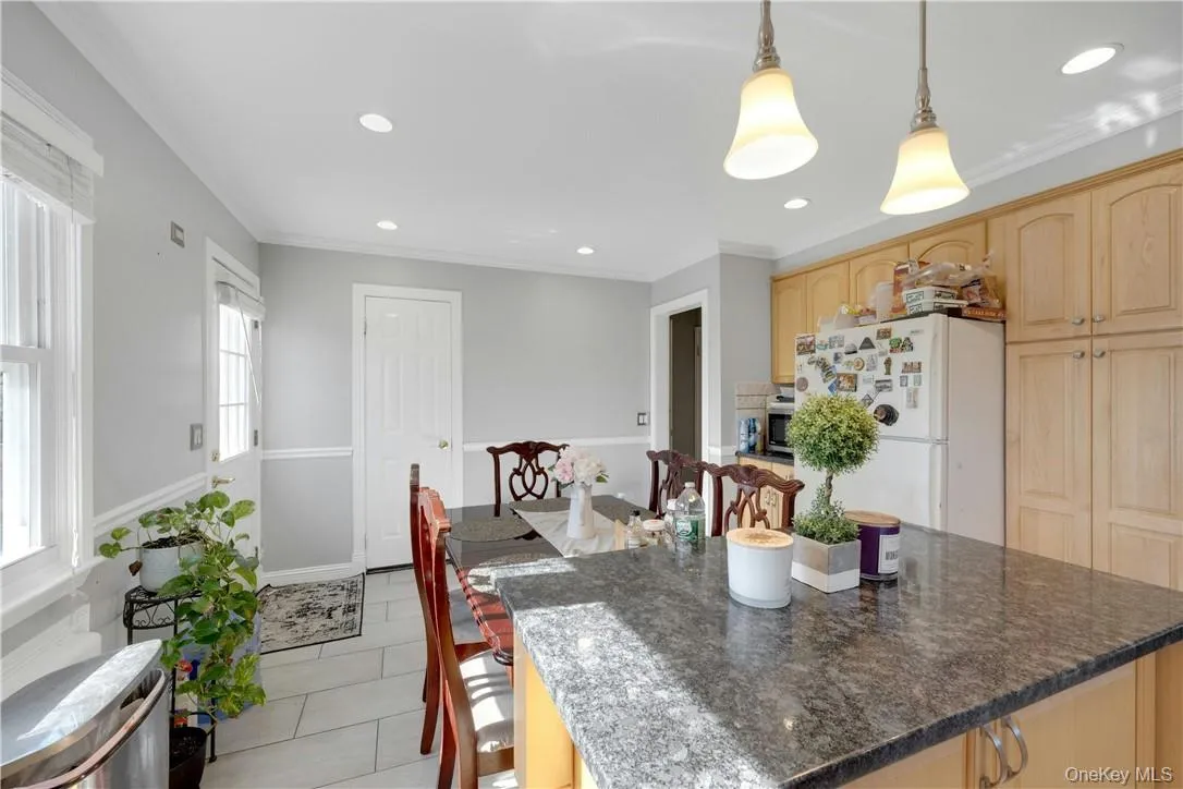 Kitchen looking toward rear deck door Kitchen looking toward rear deck door