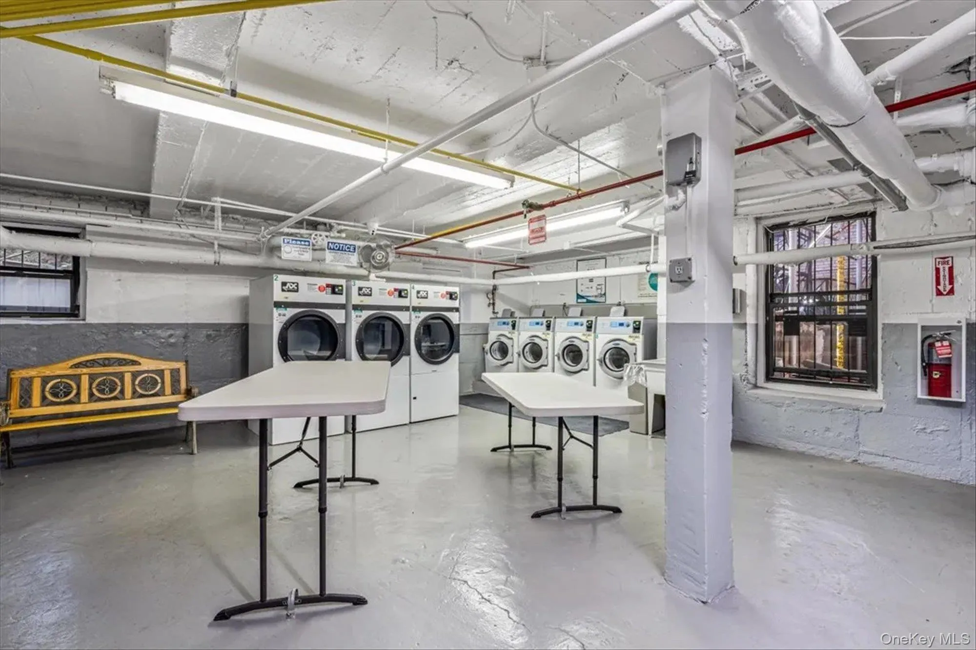 Unfinished below grade area featuring washer and clothes dryer Unfinished below grade area featuring washer and clothes dryer