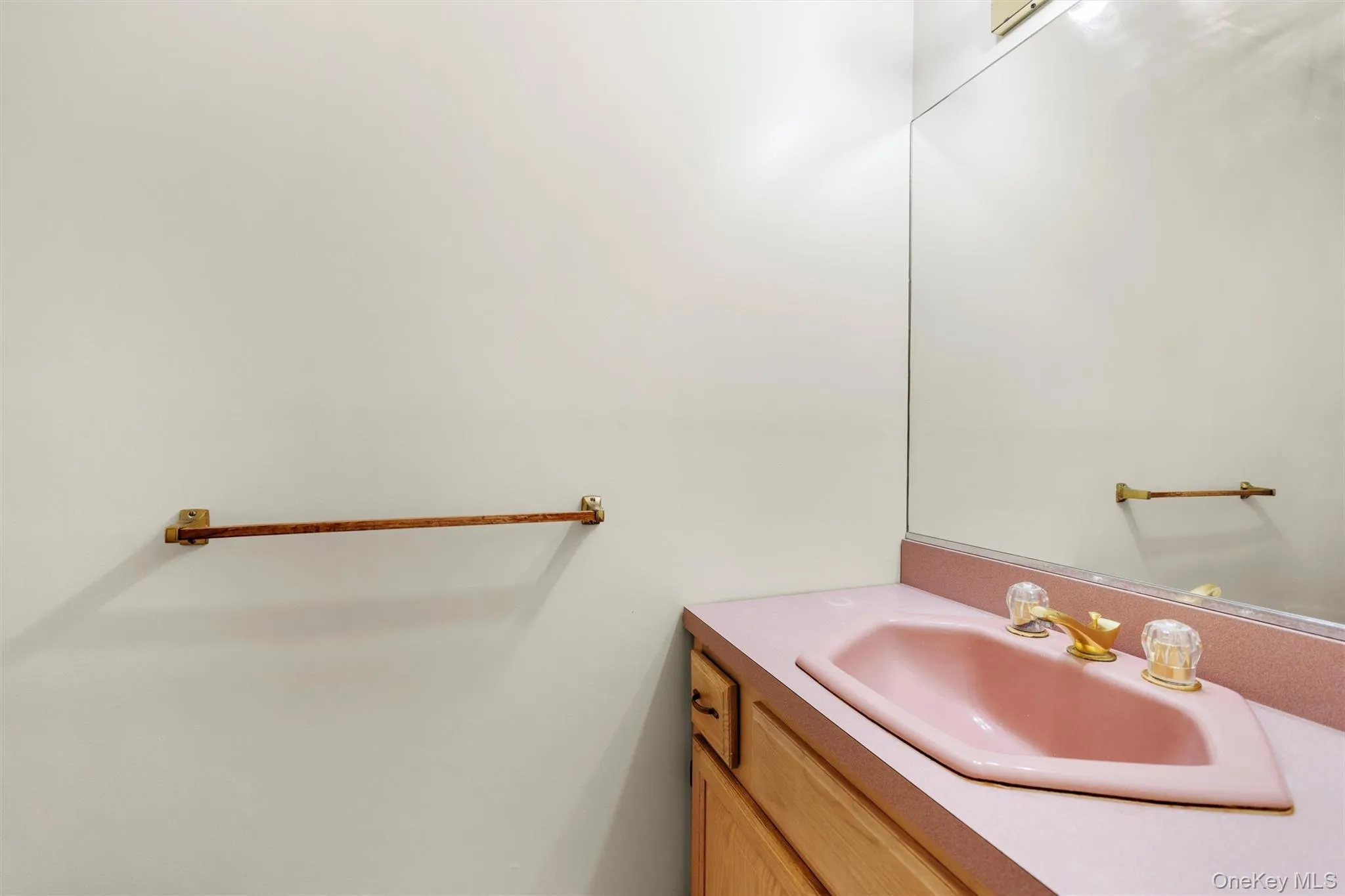 Bathroom featuring vanity Bathroom featuring vanity