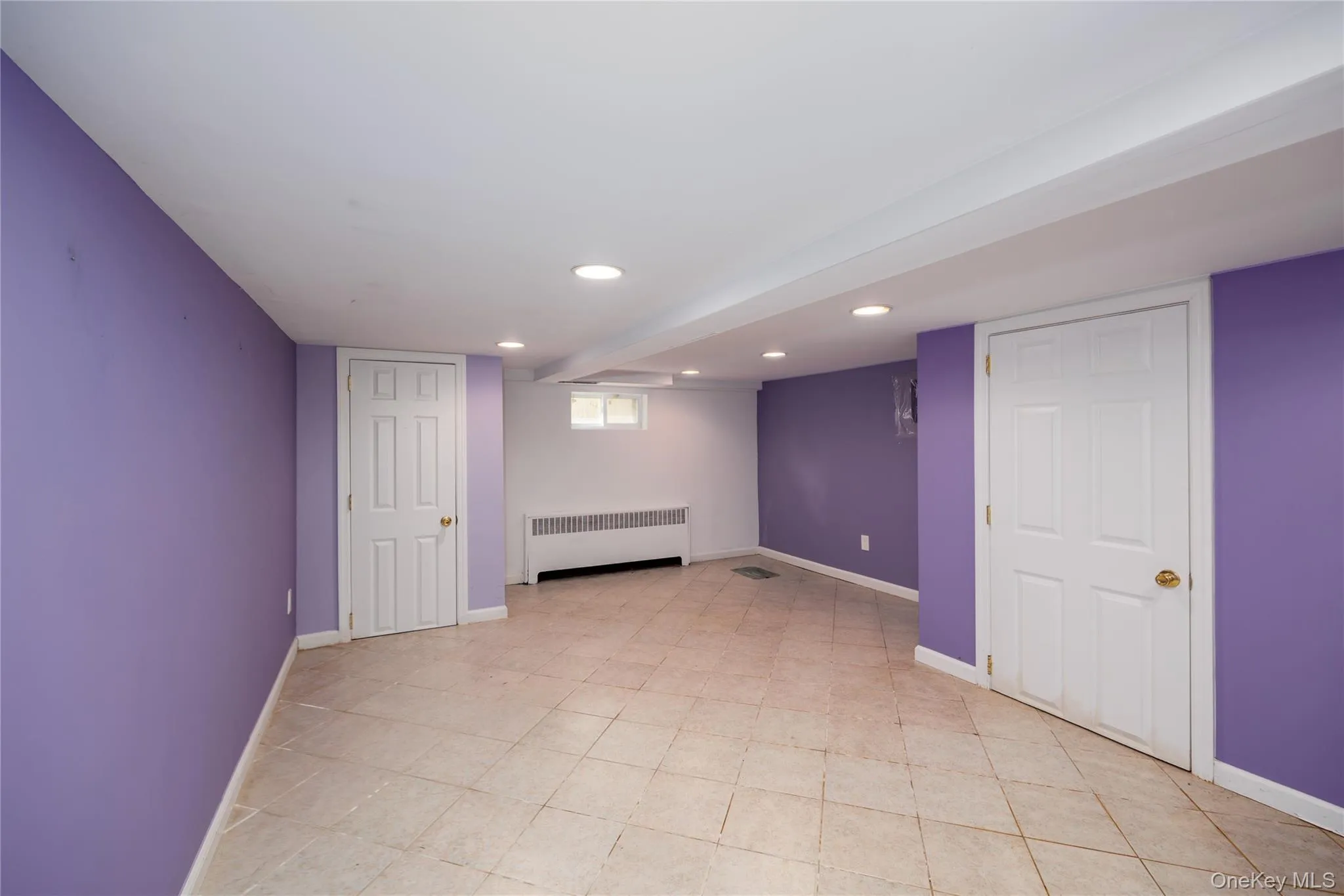 Basement featuring recessed lighting Basement featuring recessed lighting