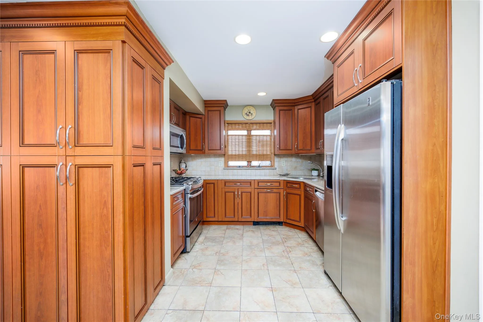 Kitchen with stainless steel appliances and recessed lighting Kitchen with stainless steel appliances and recessed lighting