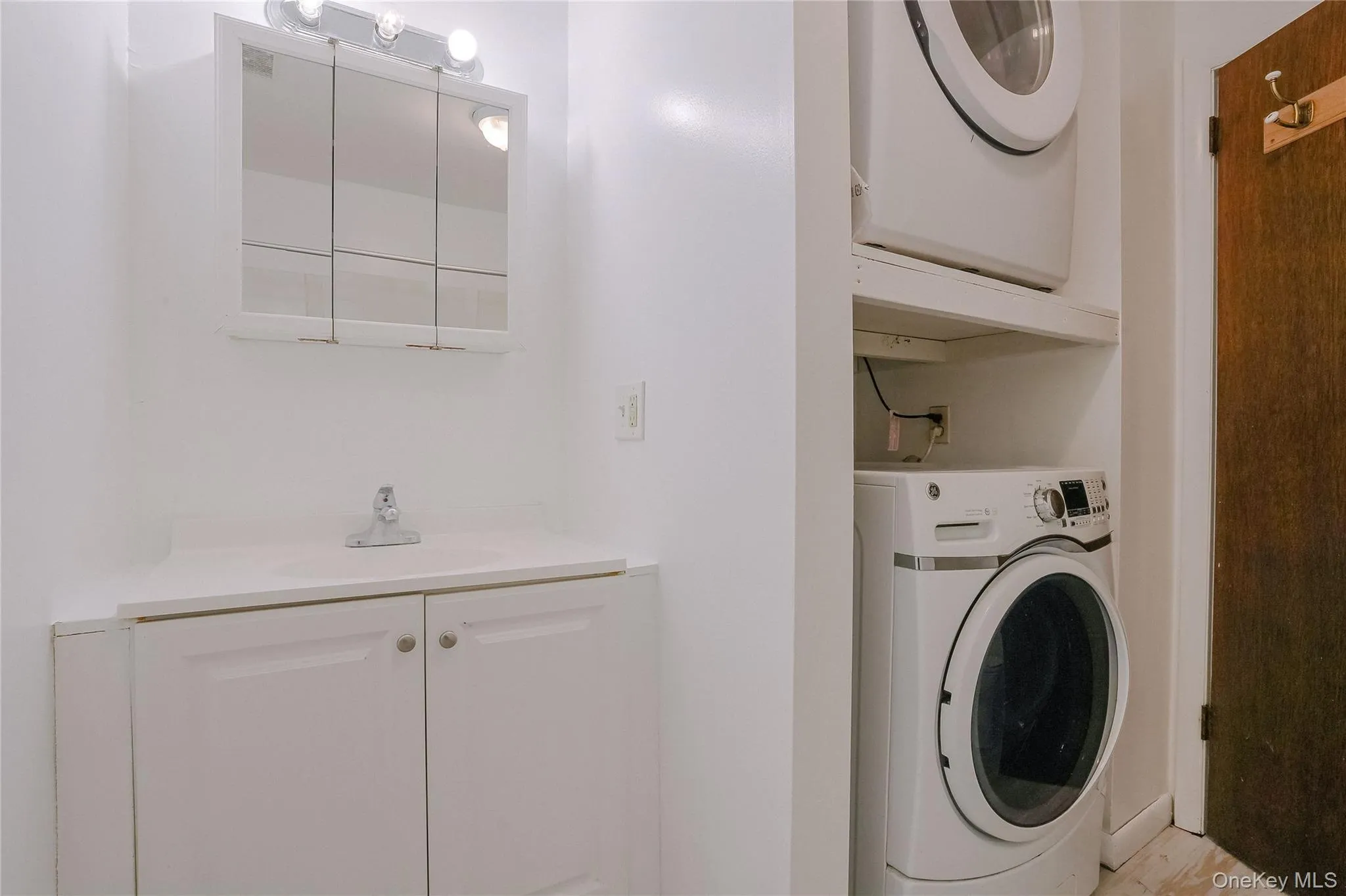 Washroom with a sink Washroom with a sink