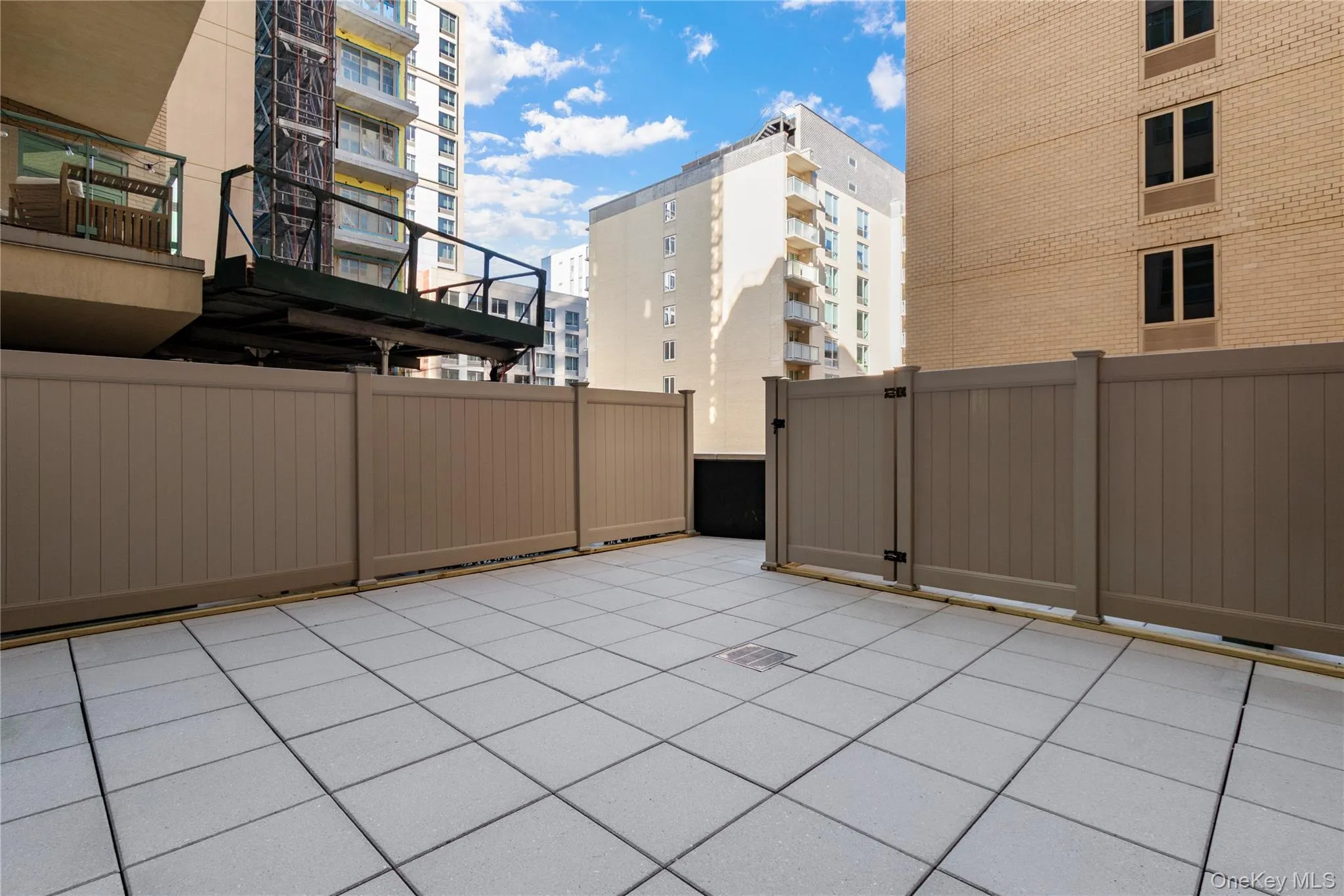 View of patio / terrace featuring a gate View of patio / terrace featuring a gate