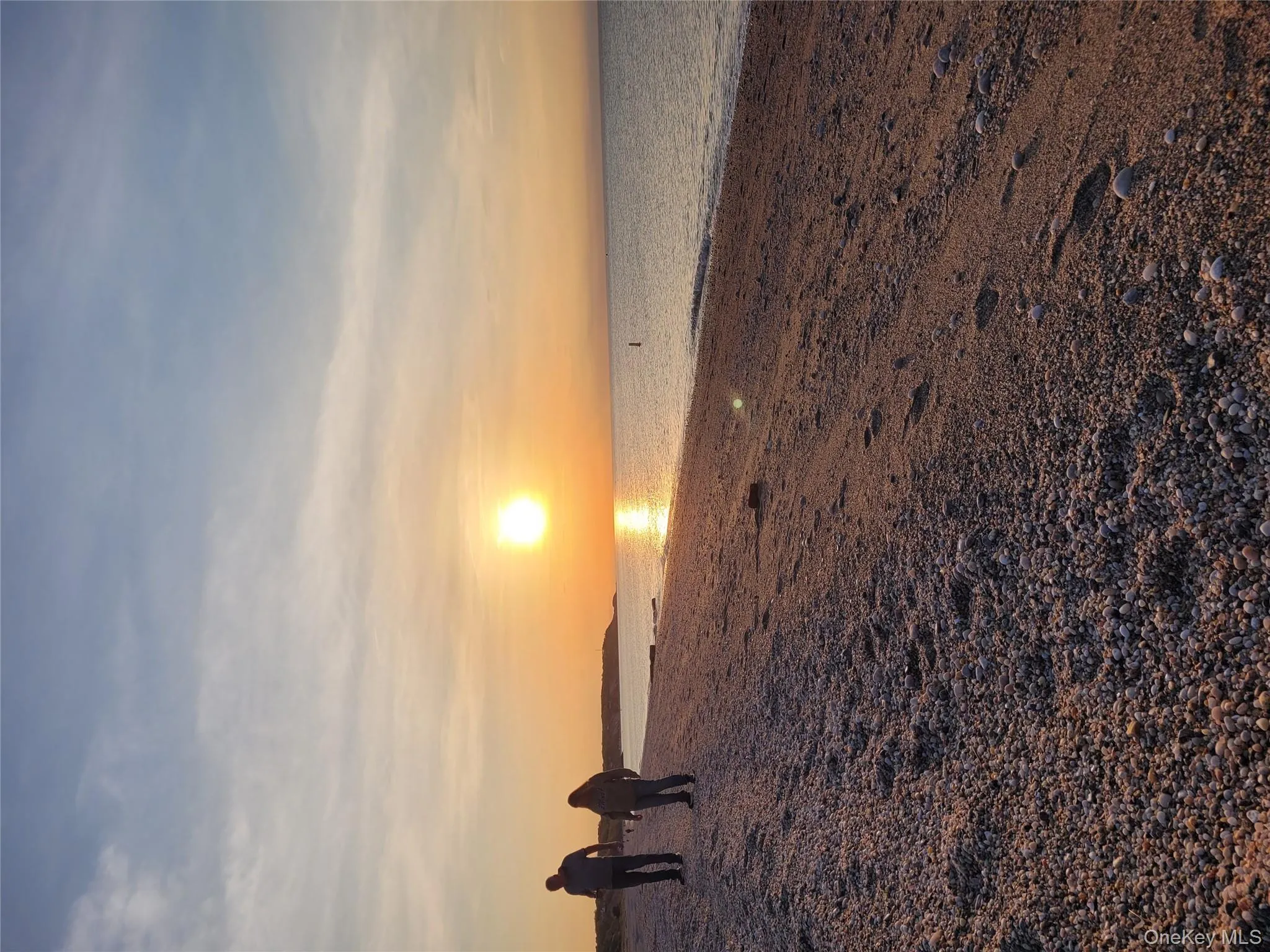 Water view featuring nearby beach Water view featuring nearby beach
