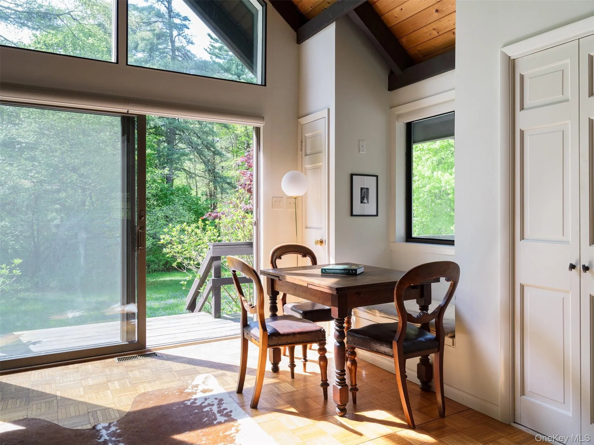 Dining room featuring wood ceiling Dining room featuring wood ceiling