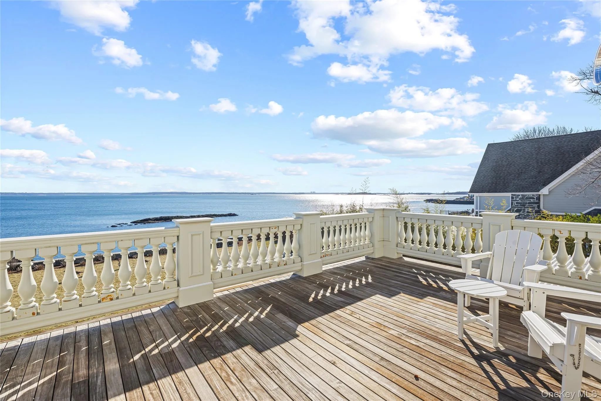 Primary Bedroom Deck with view of water and beach Primary Bedroom Deck with view of water and beach